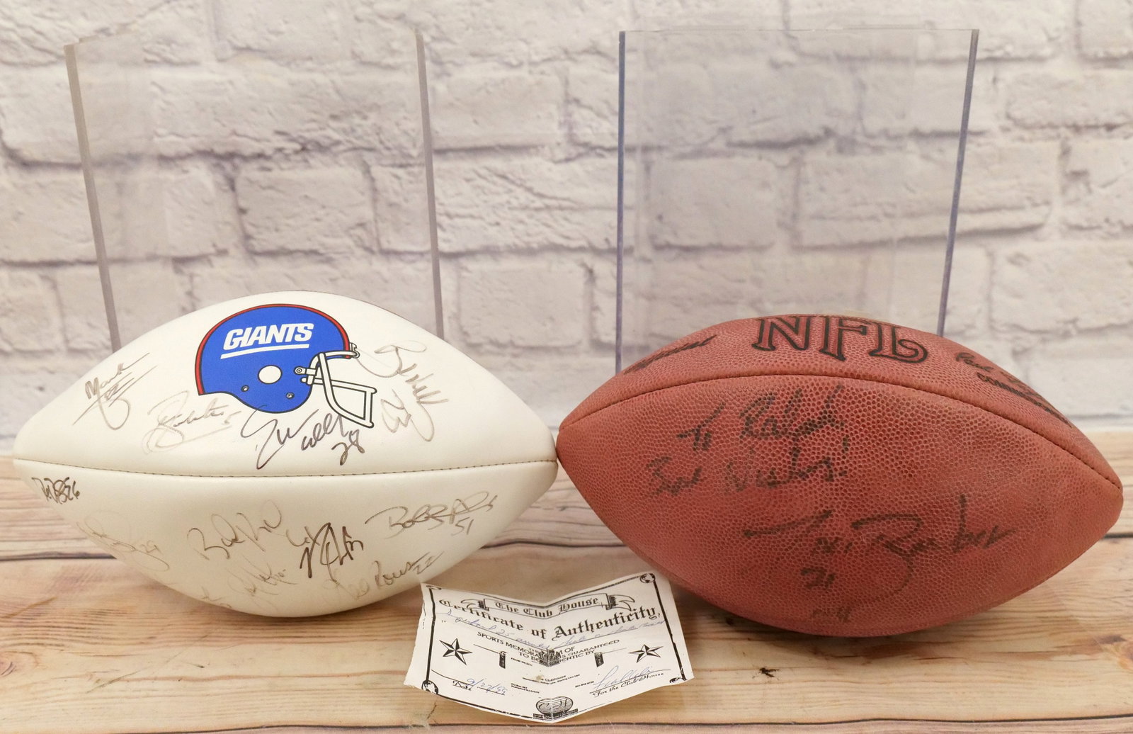 Lot of 2 New York Giants Autographed Footballs: Lot of 2 New York Giants Autographed Footballs including Brown Football Inscribed "To Ralph" Autographed by Tiki Barber and White/Brown Giants Football with many signatures - All from Superbowl XXV in