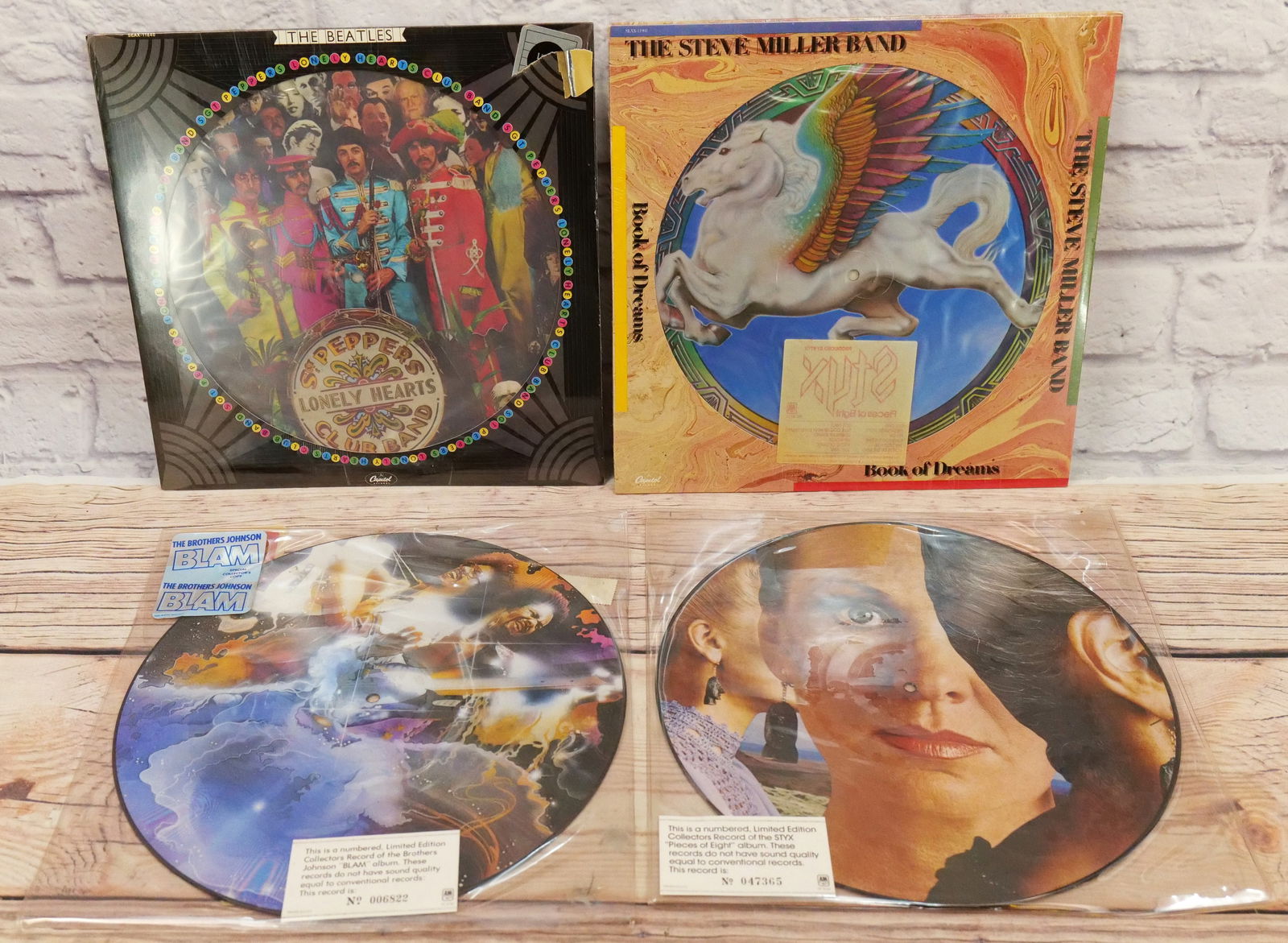 Lot of 4 Vinyl Picture Discs: Lot of 4 Vinyl Picture Discs including The Brothers Johnson - Blam - Limited Edition, Styx -Pieces of Eight - Limited Edition, The Steve Miller Band - Book of Dreams - Sealed, and The Beatles - Sgt. P