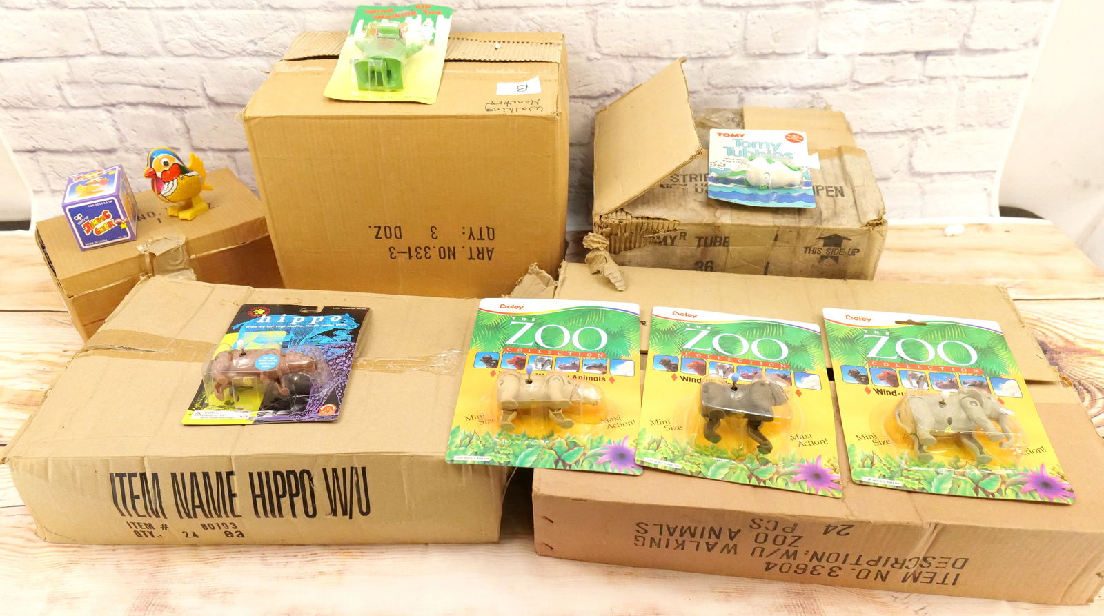 Enormous Lot of Wind-Up Toys: Enormous Lot of Wind-Up Toys including Walking Monsters, Zoo Animals, Jumping Chick. New old stock. They have been stored away for many years. May have dust/dirt on packaging. All invoices must be pai