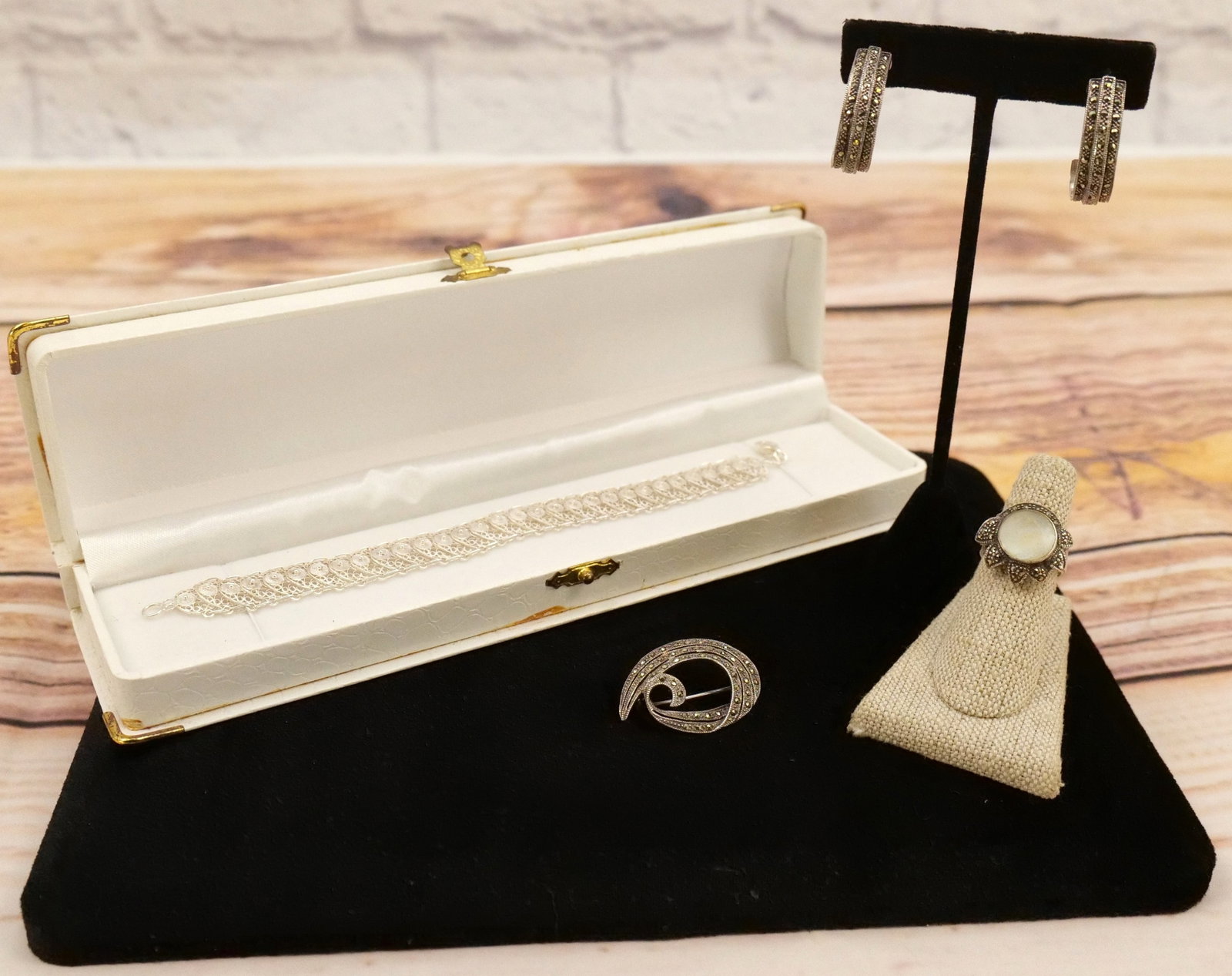 Lot of Sterling Jewelry: Lot of Sterling Jewelry including Marcasite Ring, Pin & Earrings and Filagree Bracelet. All invoices must be paid within 24 hours of the sale. We offer multiple shipping options, please read the terms