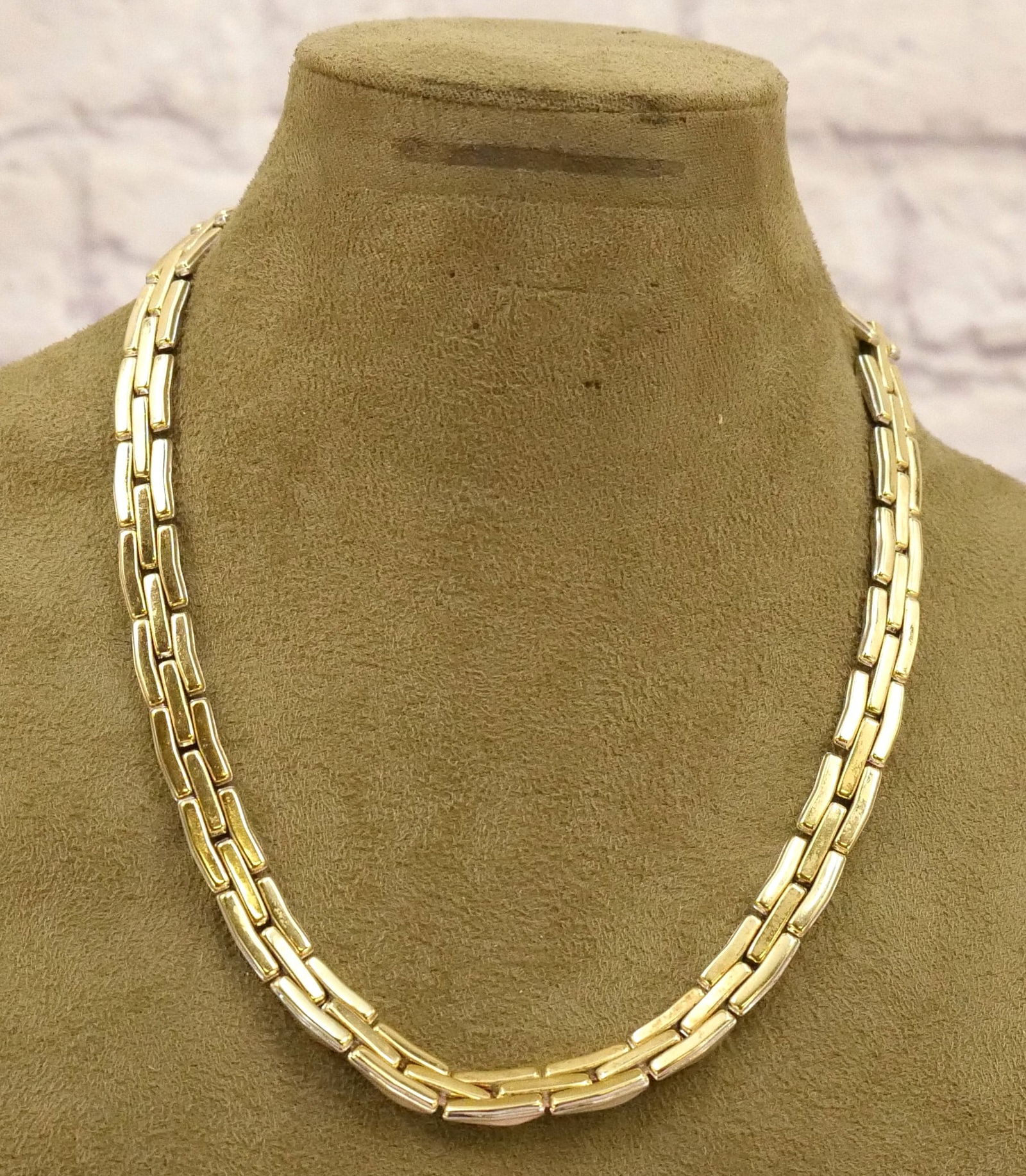 18kt Two Tone Necklace: 18kt Yellow and White Gold Two Tone Necklace. Marked Chimento. Small Round Cut Diamond in Clasp. Measures approx. 16.5". Weighs approx. 43.8 grams. All invoices must be paid within 24 hours of the sal