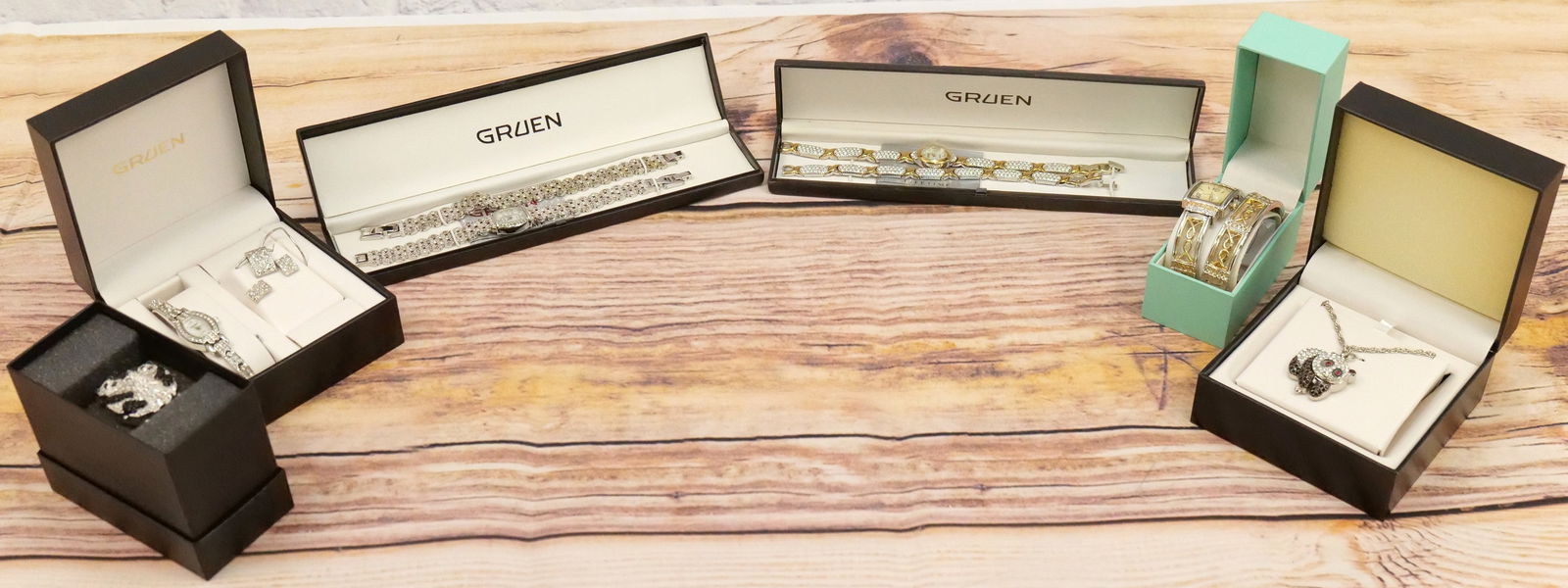 Lot of Ladies Watches: Lot of Ladies Watches including Marcasite and Rhinestone Gruen Watches, Gruen Panda Watch, and Victoria Wieck Panda Wristwatch. All invoices must be paid within 24 hours of the sale. We offer multiple