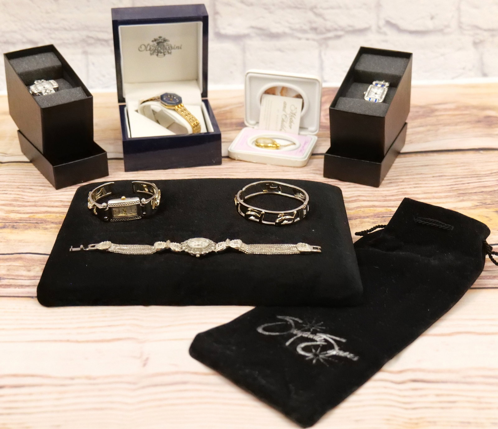 Lot of Ladies Watches: Lot of Ladies Watches including Mayfair Marcasite, (2) Franz Xavier Watches, Oleg Cassini, and More. All invoices must be paid within 24 hours of the sale. We offer multiple shipping options, please r