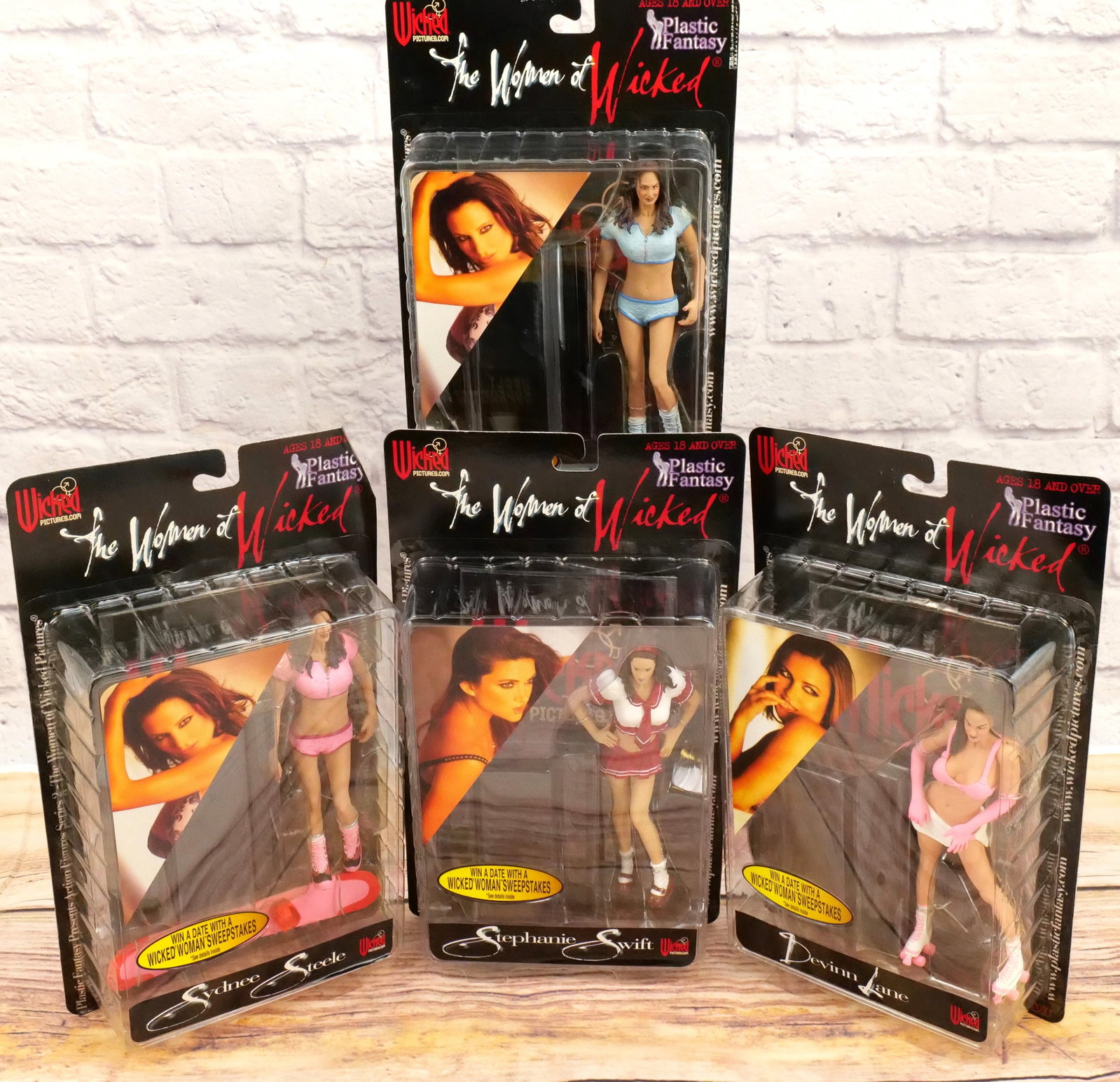 Lot of 4 The Women of Wicked Action Figures: Lot of 4 The Women of Wicked Action Figures by Plastic Fantasy including Stephanie Swift, Devinn Lane, and (2) Syndee Steele - One Pink Outfit and other Blue Outfit. All new in package. Syndee in pink