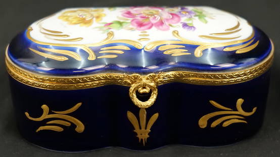 Limoges Cobalt Blue Dresser Box: Hand painted MNP Limoges France Cobalt Blue Dresser Box with Hand Painted Flowers. Measures 3" tall x 6" long. All invoices must be paid within 24 hours of the sale. We offer multiple shipping options