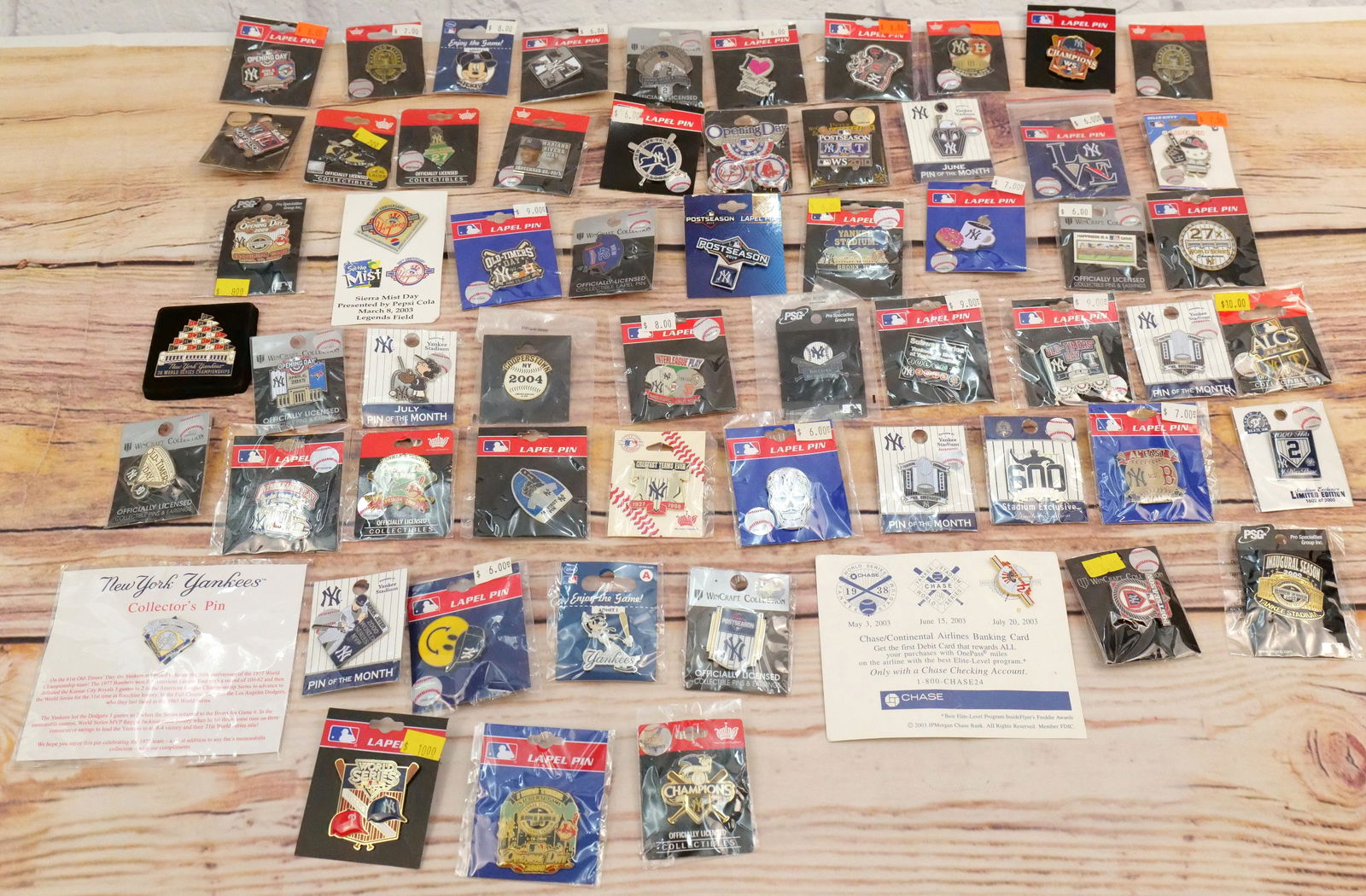 Lot of 60 New York Yankees Pins: Lot of 60 New York Yankees Pins. Including Hello Kitty, Opening Day, Post Season, Interleague Play, Mariano Rivera, Old Timers Day, Goofy, and Others. All in new condition. All invoices must be paid w