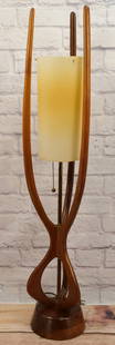 Mid Century Modern Teak Wood Table Lamp: Mid Century Modern Teak Wood Table Lamp with a Plastic Shade. Measures 42" tall x 9" diameter. All invoices must be paid within 24 hours of the sale. We offer multiple shipping options, please read th