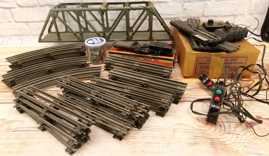 Group Lot of Lionel O27 Tubular Track and Accessories: Group Lot of Lionel O27 Tubular Track and Accessories. Includes USC Remote Control Track Set, Curved Track, Straight Track and No. 022 Switch Tracks. Lot also includes a Trestle Bridge. All invoices m