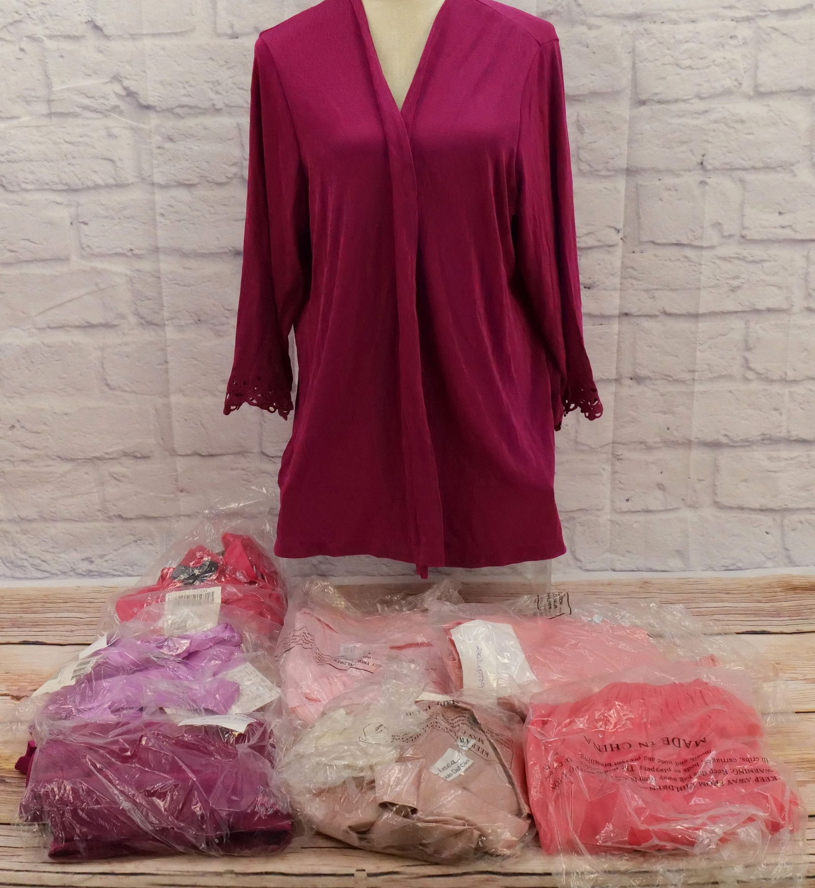 Large Lot of Ladies QVC Clothing: Large Lot of Ladies QVC Clothing including Designers such as Simply Chloe Dao, Denim & Company, Linea by Louis Dell, Susan Graver, CitiKnits, Dialogue, Mark Zunino. All size 1X. Lot includes Tunics an