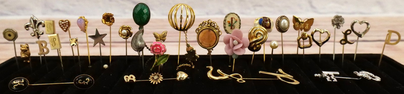 Lot of Stick Pins: Lot of Stick Pins. Some Rhinestone, Enamel, Faux Pearl, Moonstone, Needlepoint and More. All invoices must be paid within 24 hours of the sale. We offer multiple shipping options besides the Liveaucti