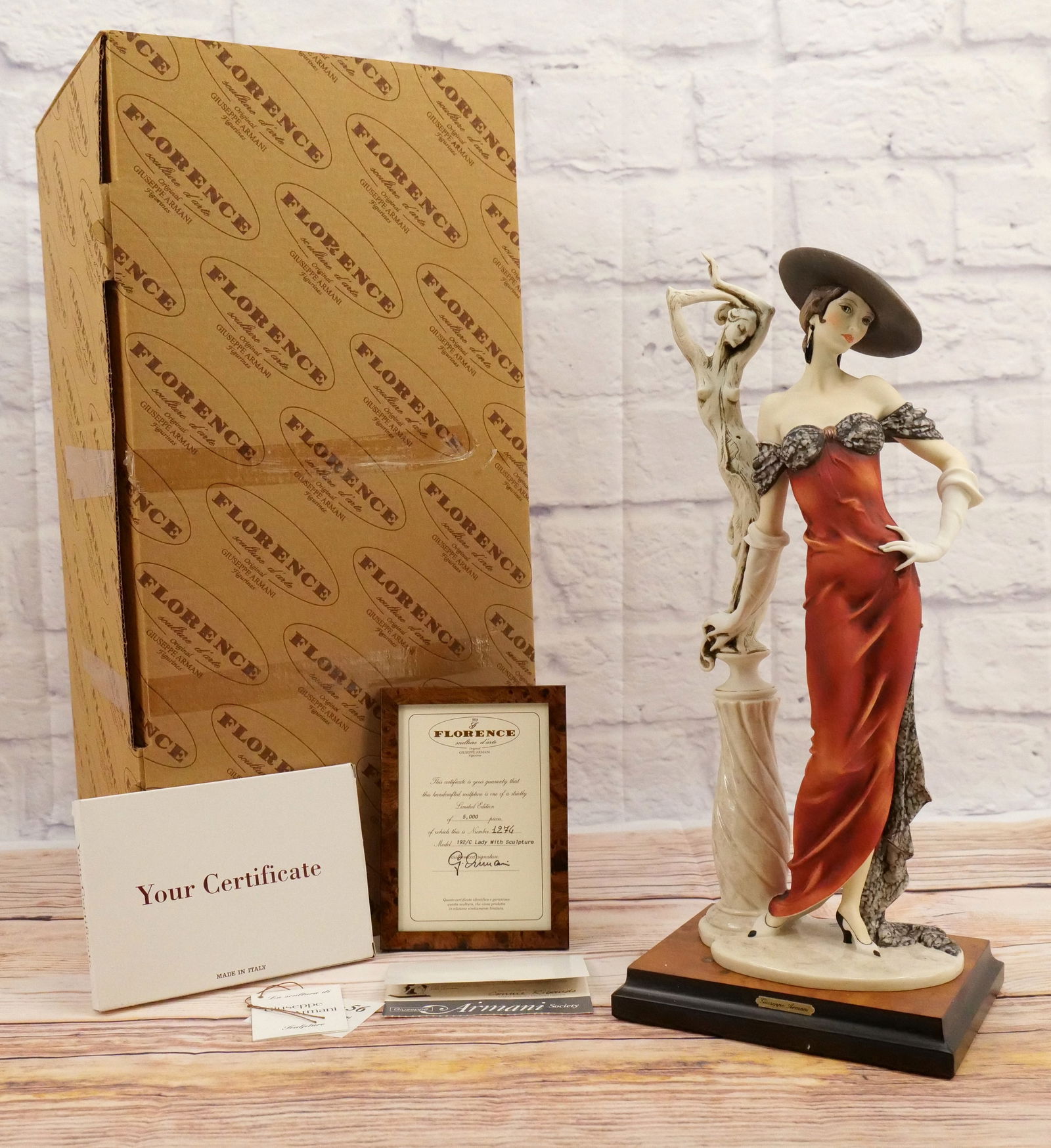 Giuseppe Armani Fascination Figurine: Giuseppe Armani Fascination (Lady with Sculpture) Figurine. Art 192-C - 1992 - Limited Edition #1274/5000. Hand Signed by Connie Ribaudo - Executive Director. Made in Italy. Measures 18.25" tall. Come