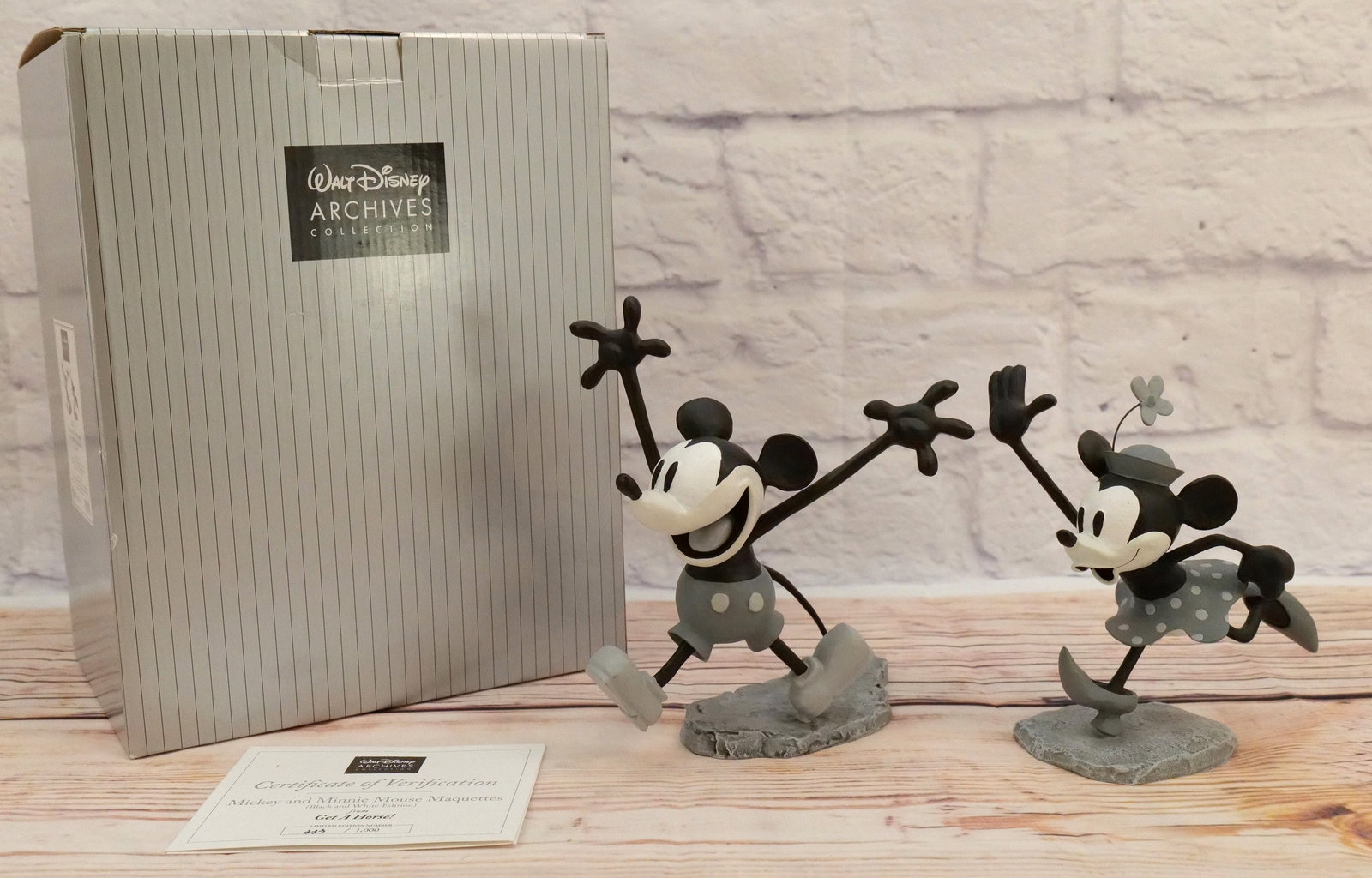 Walt Disney Archives Mickey and Minnie Mouse Maquettes: Walt Disney Archives Collection Mickey and Minnie Mouse Maquettes (Black and White Edition) from Get a Horse! Limited Edition 333/1000. Largest measures 8" tall. Small crack on Mickey's Tail...Is stil