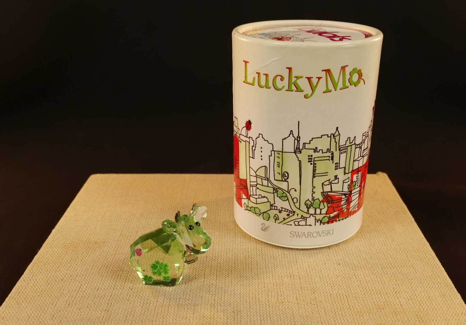 Swarovski Lucky Mo Limited Edition Cow Figurine: Swarovski Lucky Mo Limited Edition Cow Figurine - 2012 Lovlots. Comes in the original box. Measures approx. 2" tall. All invoices must be paid within 24 hours of the sale. We offer multiple shipping o