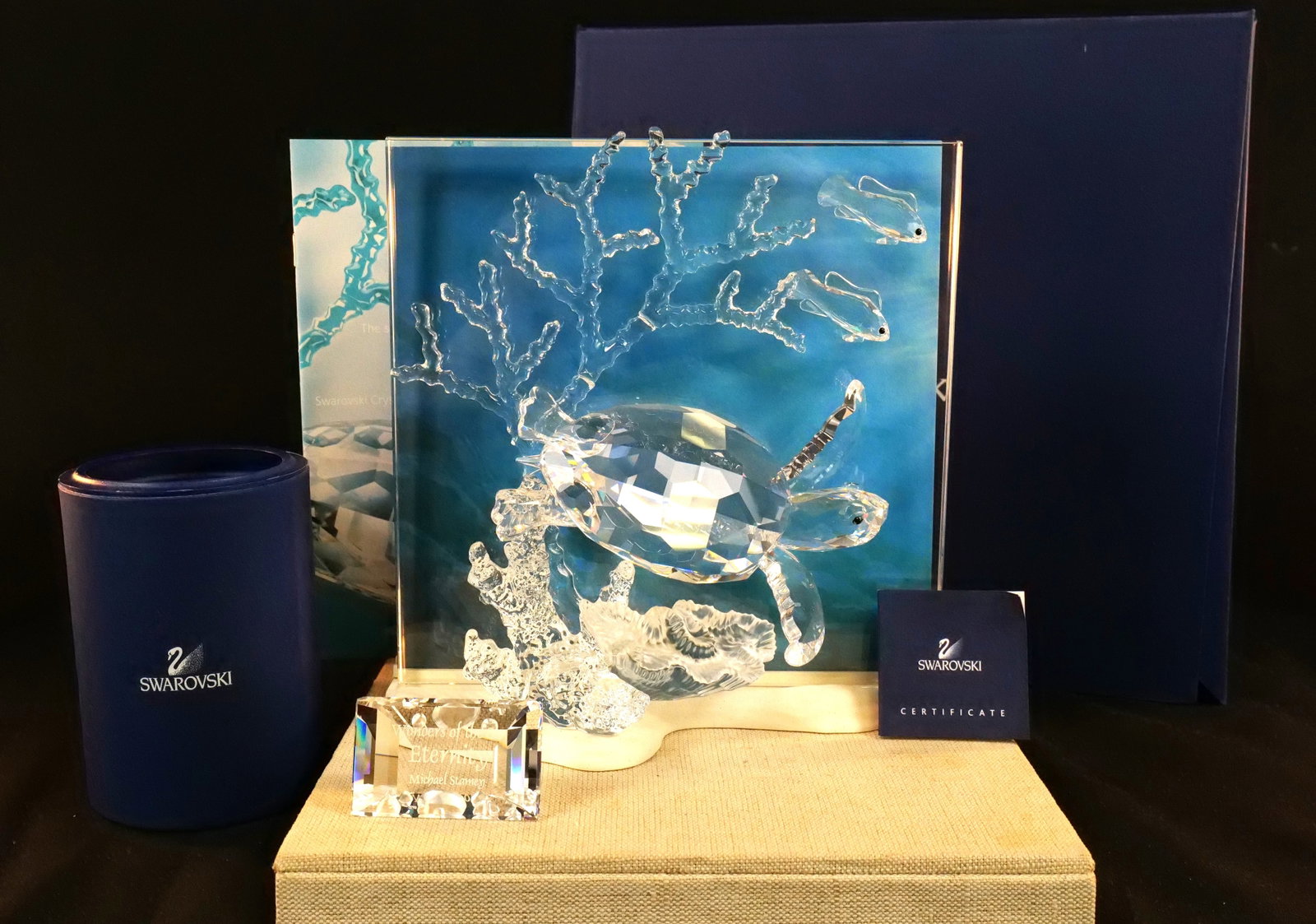 Swarovski Wonders of the Sea Eternity Figurine with Plaque: Swarovski Crystal Wonders of the Sea - Eternity (Clear) Figurine/Plaque - SCS 2006. Features Sea Turtle. Item #0726028. Also included is the Wonders of the Sea Eternity Title Plaque. Measures approx. 