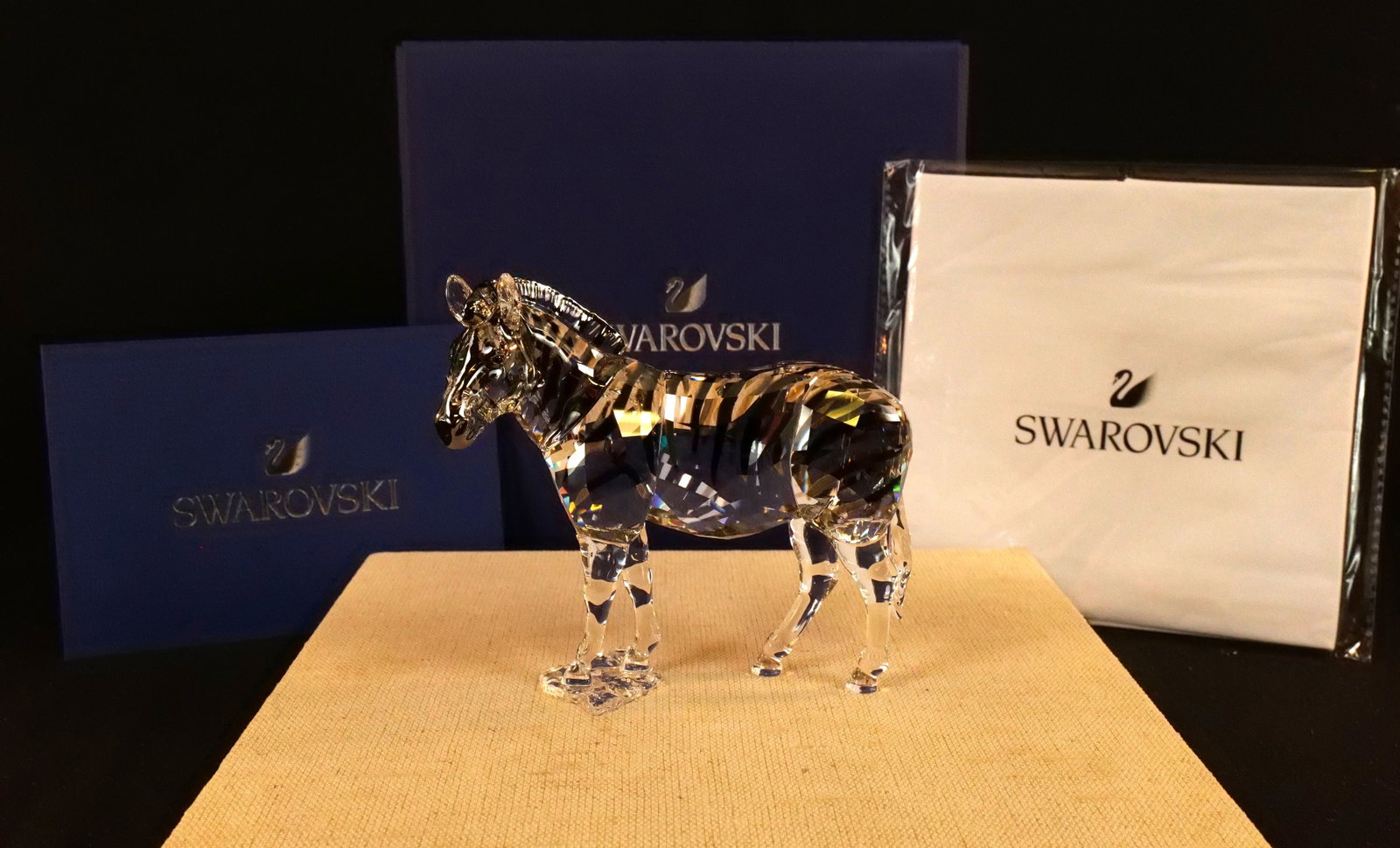 Swarovski Elegance of Africa Zebra Amai Figurine: Swarovski Crystal Elegance of Africa Zebra Amai Figurine - SCS 2021. Item #5550663. Measures 4.5" tall x 4.75" long. Comes in original box. All invoices must be paid within 24 hours of the sale. We of