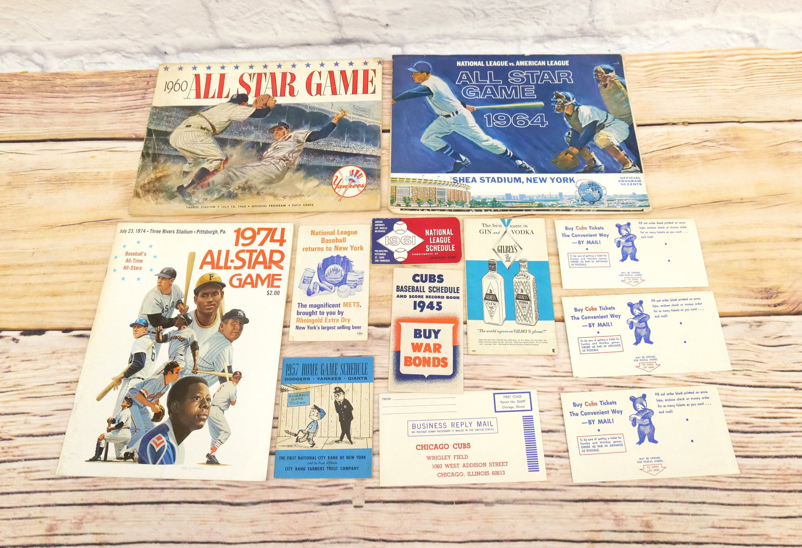 Lot of Vintage Baseball Memorabilia: Lot of Vintage Baseball Memorabilia. Including 3 All-Star Game Programs (1960, 1964, & 1974), 1945 Cubs Baseball Schedule, (5) Chicago Cubs Ticket Orders - Some with maps to get to Wrigley Field, 1957