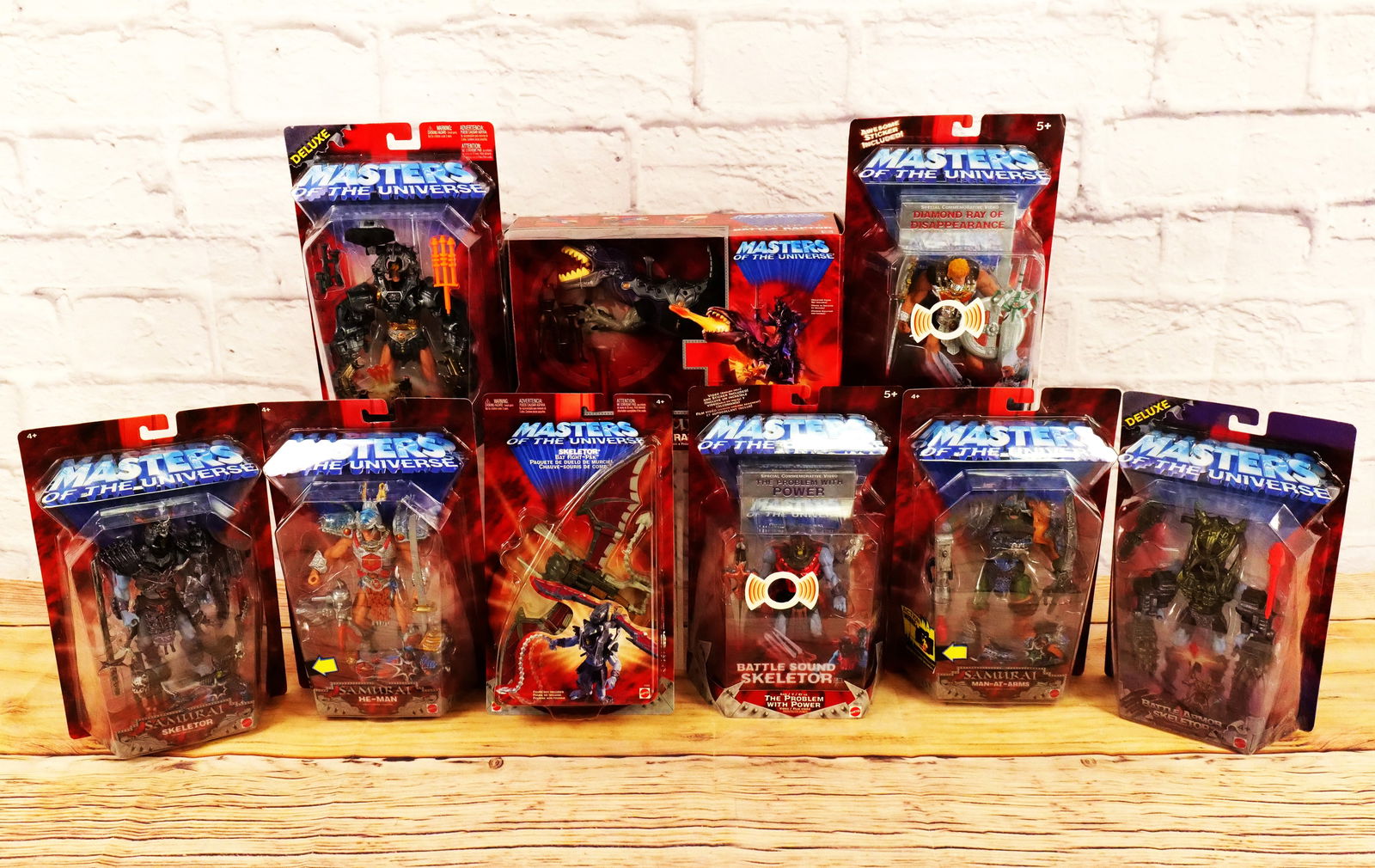 Lot of Mattel Masters of the Universe Collectibles: Lot of Mattel Masters of the Universe Collectibles from the Early 2000's including Samurai Battle Raptor, and Action Figures of Samurai Man-At-Arms, Samurai He-Man, Samurai Skeletor, Battle Armor Skel