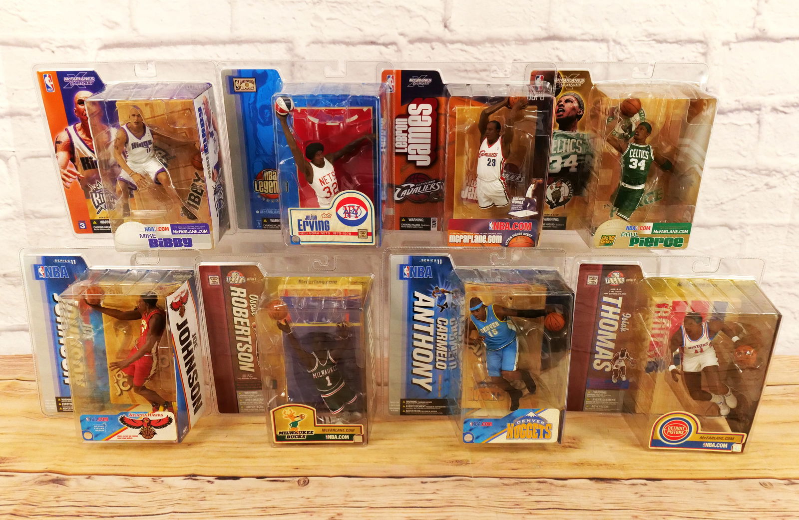 Lot of 8 McFarlane NBA Sports Figures - Mixed Series: Lot of 8 McFarlane NBA Sports Figures - Mixed Series. Including Series 3 - Mike Bibby & Paul Pierce. Series 5 - LeBron James. Series 11 - Joe Johnson and Carmelo Anthony. Legends Series 1 - Julius Erv