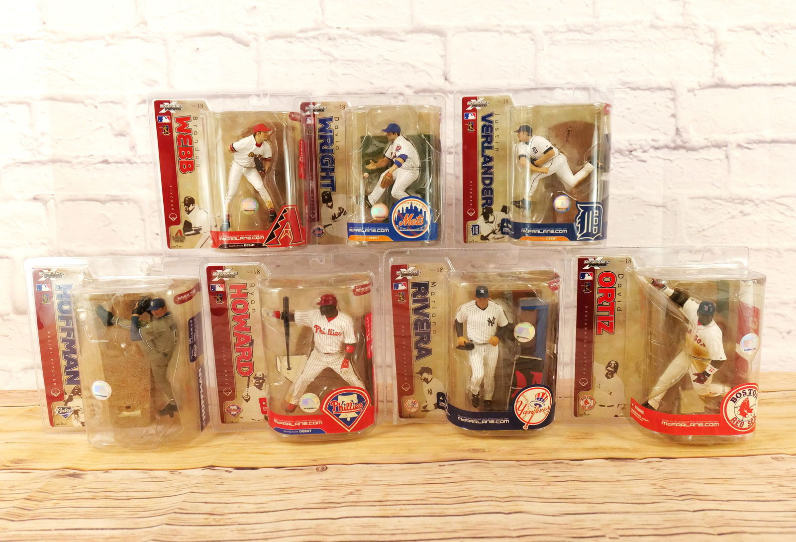 Lot of 7 McFarlane MLB Sports Figures - Series 18: Lot of 7 McFarlane MLB Sports Figures - Series 18. Includes David Wright, Mariano Rivera, Ryan Howard, Trevor Hoffman, Justin Verlander, David Ortiz, and Brandon Webb. All new in package. Some discolo