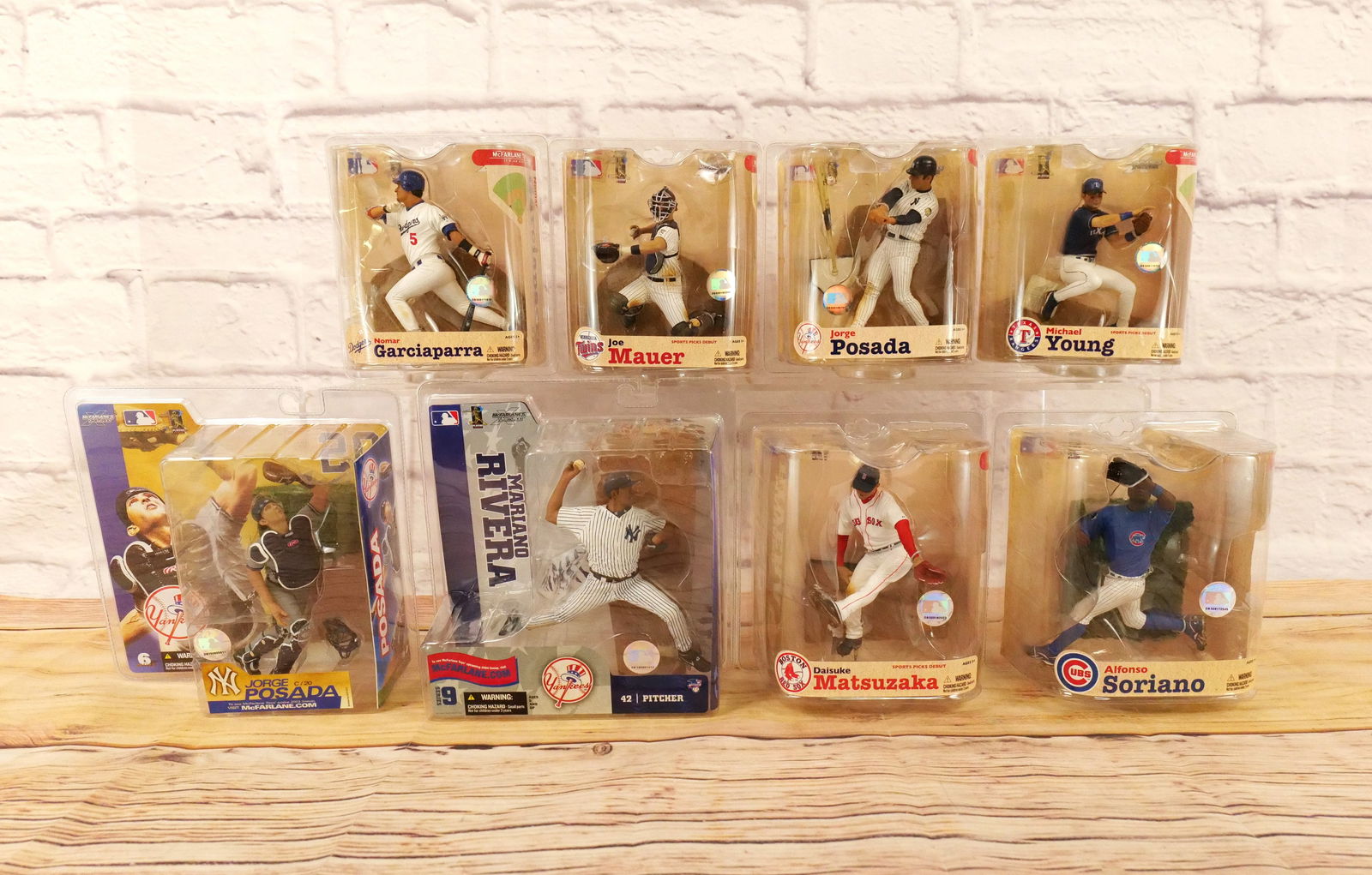 Lot of 8 McFarlane MLB Sports Figures - Mostly Series 21: Lot of 8 McFarlane MLB Sports Figures - Mostly Series 21. Includes Series 21 - Nomar Garciaparra, Jorge Posada, Michael Young, Joe Mauer, Alfonso Soriano, and Daisuke Matsuzaka. Also includes Series 6