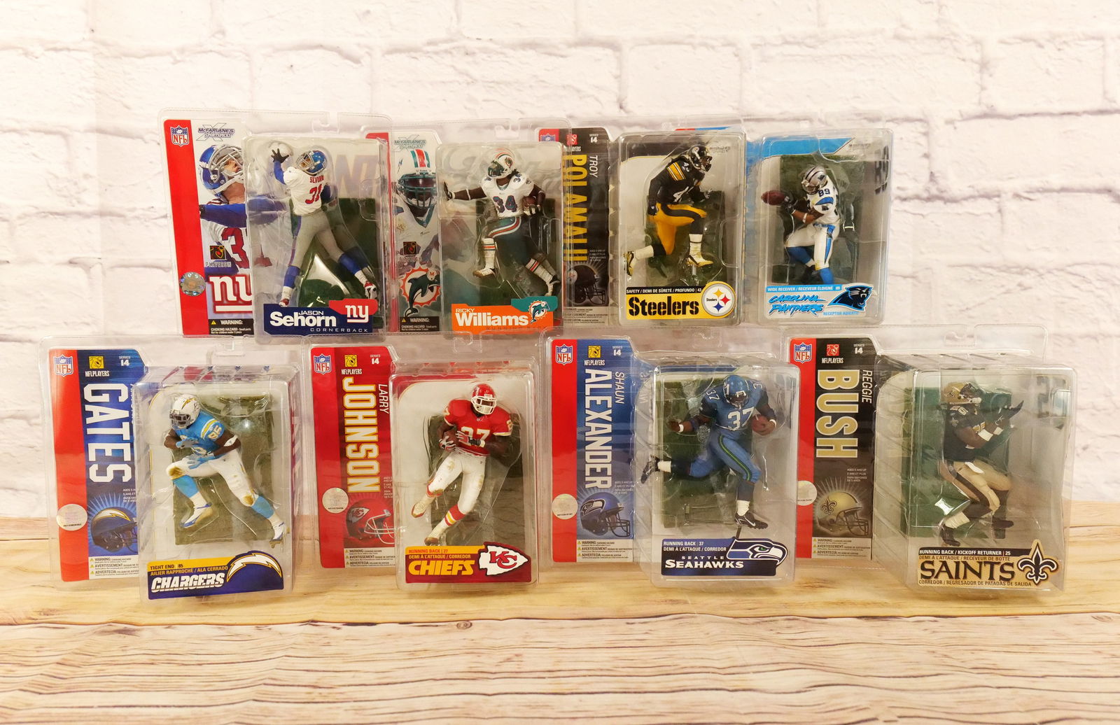Lot of 8 McFarlane NFL Sports Figures - Mostly Series 14: Lot of 8 McFarlane NFL Sports Figures - Mostly Series 14. Series 14 includes Steve Smith, Antonio Gates, Larry Johnson, Shaun Alexander, Troy Polamalu, and Reggie Bush. Also includes Series 4 - Jason