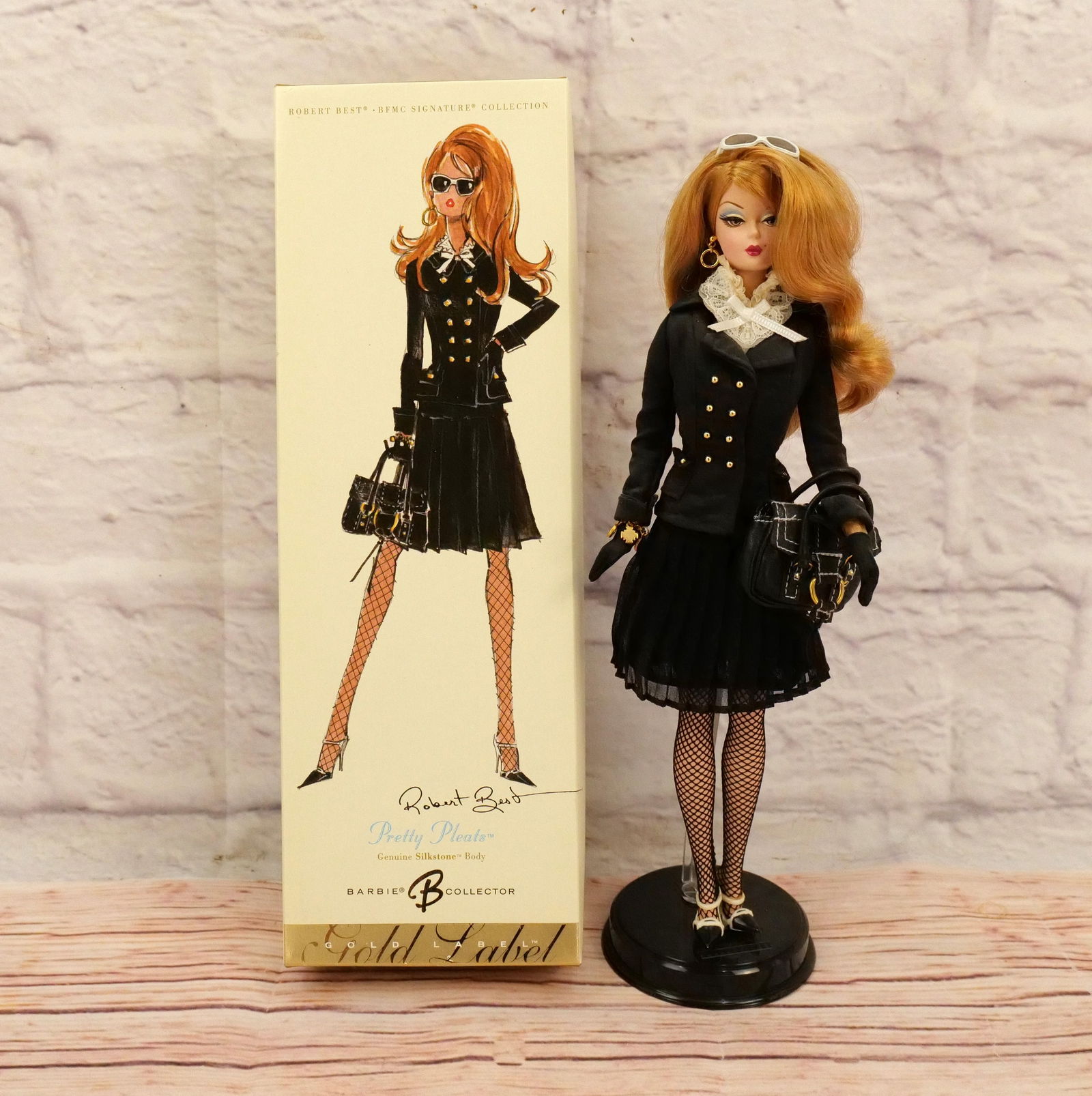 Silkstone Pretty Pleats Barbie Doll: Silkstone Pretty Pleats Barbie Doll - Robert Best BFMG Signature Collection - Barbie Collector Gold Label. Complete in Box. This collection came from an estate who did enjoy and display many of her Ba