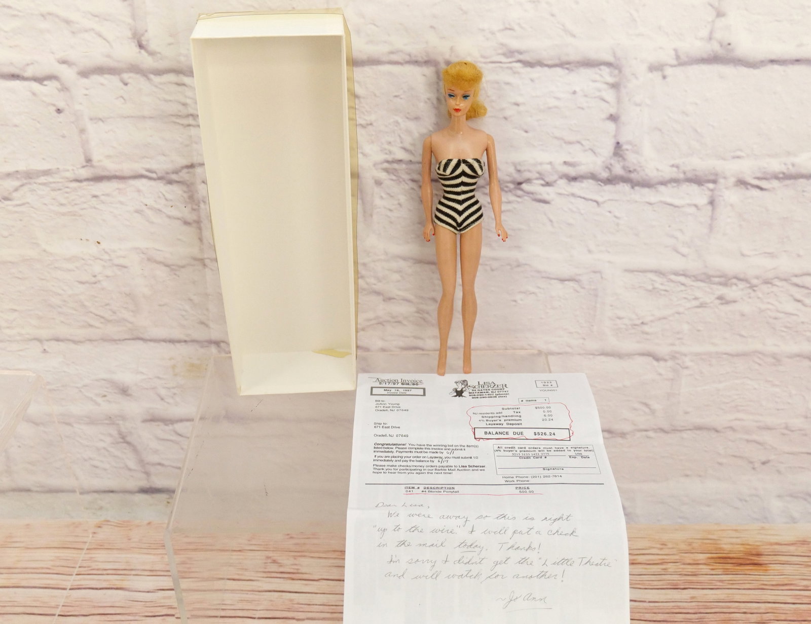 Vintage Barbie - Blonde #4: Vintage Barbie - Blonde #4. Has a hard curl. Body not faded. Black and White Swimsuit. Copyright ATS PE. MCMLVIII by Mattel Inc. #7 on left cheek of bottom. All invoices must be paid within 24 hours o