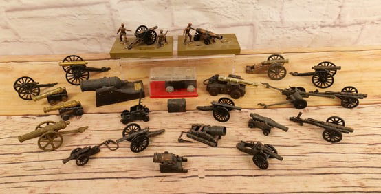 Lot of Cannon Pencil Sharpeners and Toys