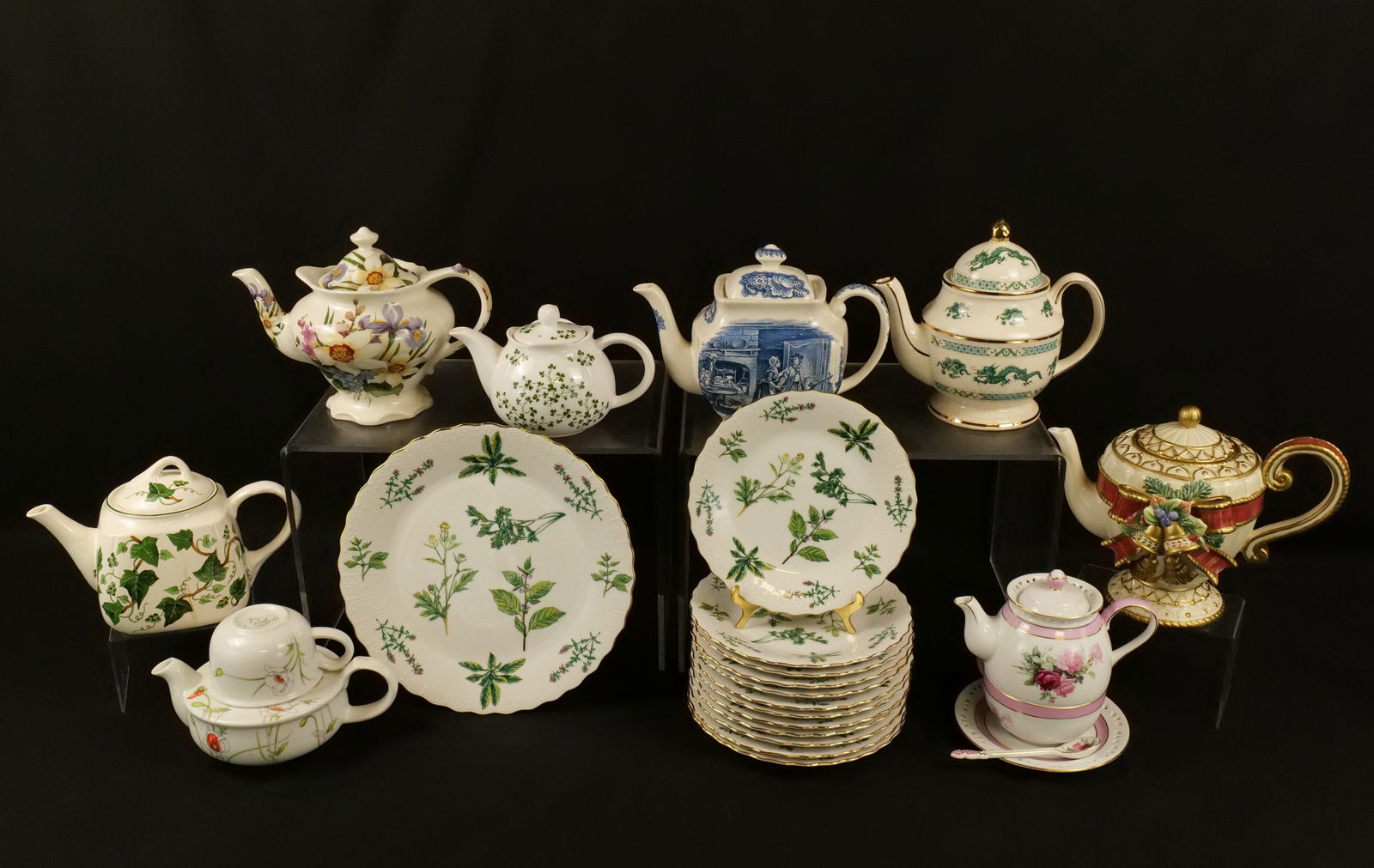 Group Lot of Teapots and Dessert Plates: Group Lot of Teapots and Dessert plates. Lot contains English Liberty Blue, Sadler, Fitz & Floyd, Price, Andrea, and other various makers. All invoices must be paid within 24 hours of the sale. We off