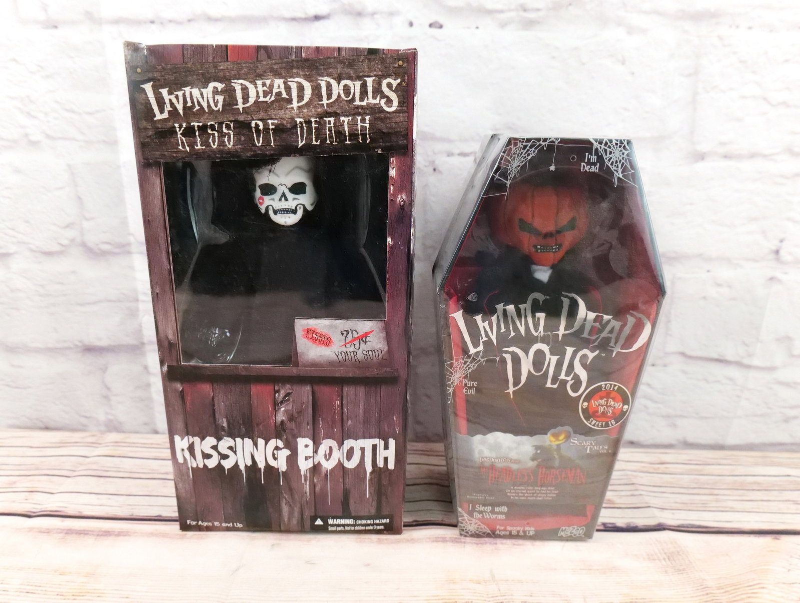 Lot of 2 Mezco Living Dead Dolls Figures: Lot of 2 Mezco Living Dead Dolls Figures including Scary Tales The Headless Horseman and Kiss of Death - Kissing Booth Figure. Both new in box. All invoices must be paid within 24 hours of the sale. W
