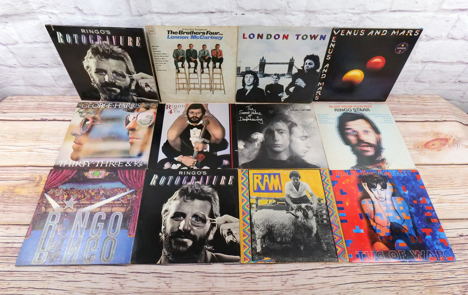 Lot of 12 Beatles Solo Records: Lot of 12 Beatles Solo Records including Siblings and Children. Including Ringo Starr, Julian Lennon, The Brothers Four, George Harrison, Paul McCartney, and Wings. All come with outer sleeves. Sleeve