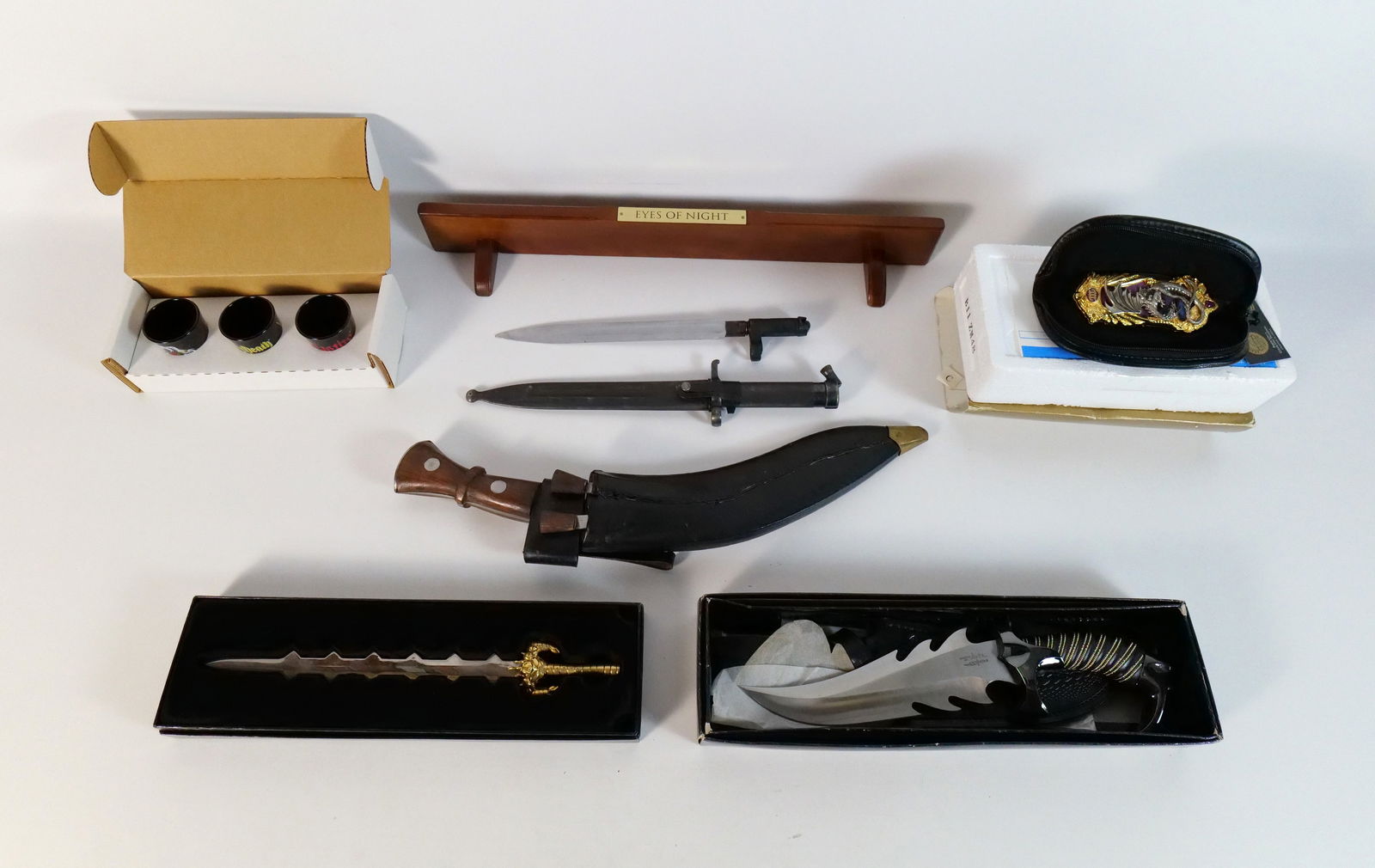 Lot of Collectible Knives, Swords, and Shot Glasses: Lot of Collectible Knives, Swords, and Shot Glasses. Including Lady Death Sword Collection, Franklin Mint Collector Knife, Raptor Fantasy Fighter, and More. All invoices must be paid within 24 hours o