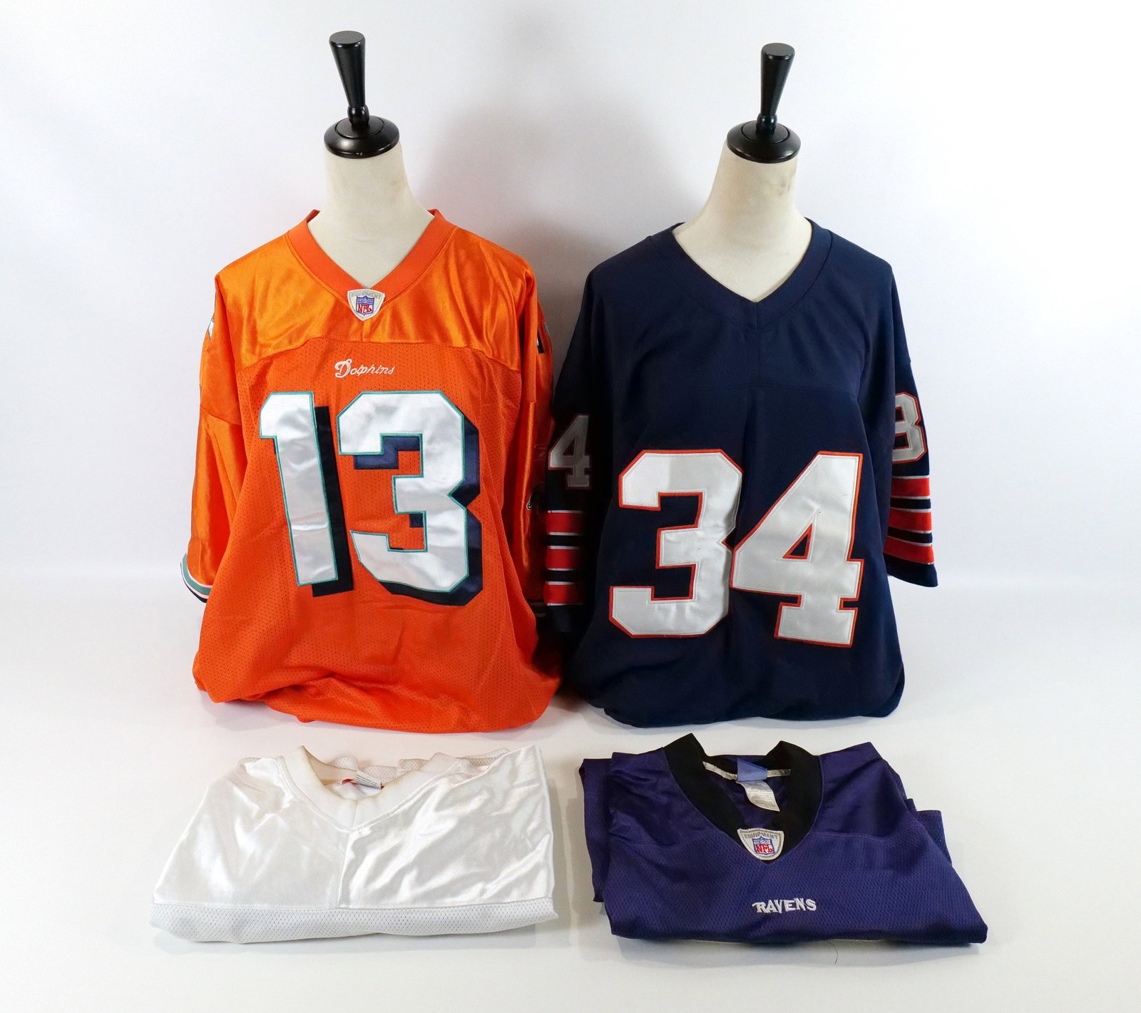 Lot of 4 NFL Jerseys: Lot of 4 NFL Jerseys including Reebok Dan Marino Miami Dolphins Size 60, Michell & Ness Kellen Winslow San Diego Chargers Size 54, Unbranded Walter Payton Chicago Bears Size 58 and Reebok Willis McGah