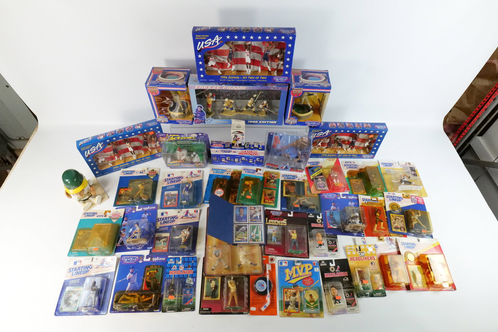 Large Lot of Sports Figures: Large Lot of Sports Figures (2 Boxes Full). Mostly Starting Lineup. Some figures including USA Basketball Box Sets, Freeze Frame Box Set, Stadium Stars Figures, Headline Collection, NFL, Hockey, Baseb