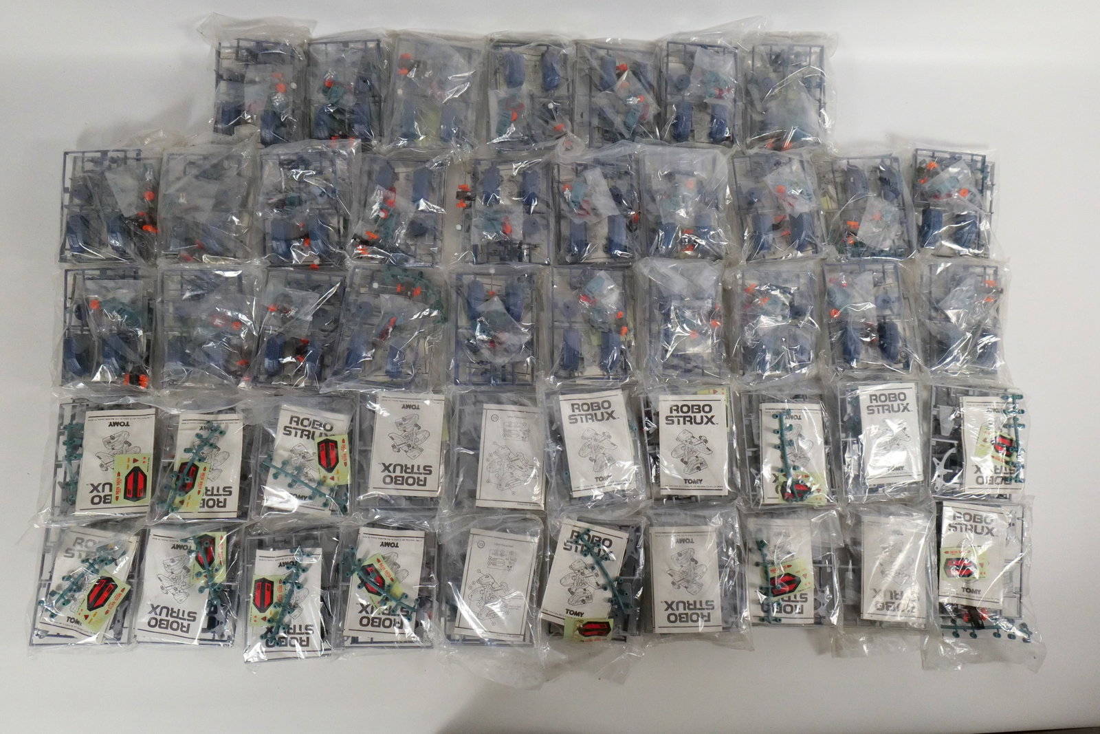 Tomy Robostrux Special Edition - 48 Pieces: Case Lot of Tomy Robostrux Special Edition Toys. Contains 48 Pieces. Sealed. New Old Stock. Removed from original case and put into box lot. All invoices must be paid within 24 hours of the sale. We o