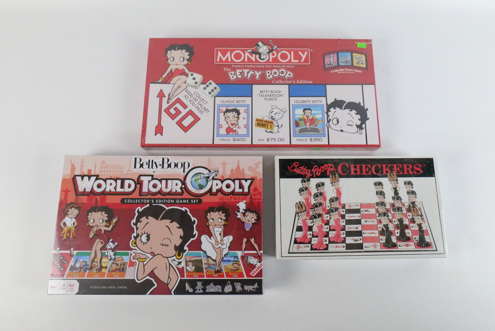 Lot of 3 Sealed Betty Boop Games: Lot of 3 Sealed Betty Boop Games including Checkers, World Tour-Opoly, and Betty Boop Monopoly. All invoices must be paid within 24 hours of the sale. We offer multiple shipping options please read th