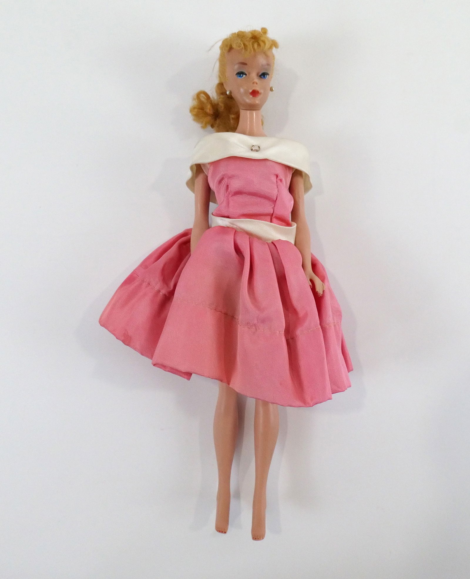 Vintage Barbie Doll - Blonde #4: Vintage Barbie Doll - Blonde #4. Face has some discoloration on face and on the back of the calves. Staining present on dress. All invoices must be paid within 24 hours of the sale. We offer multiple