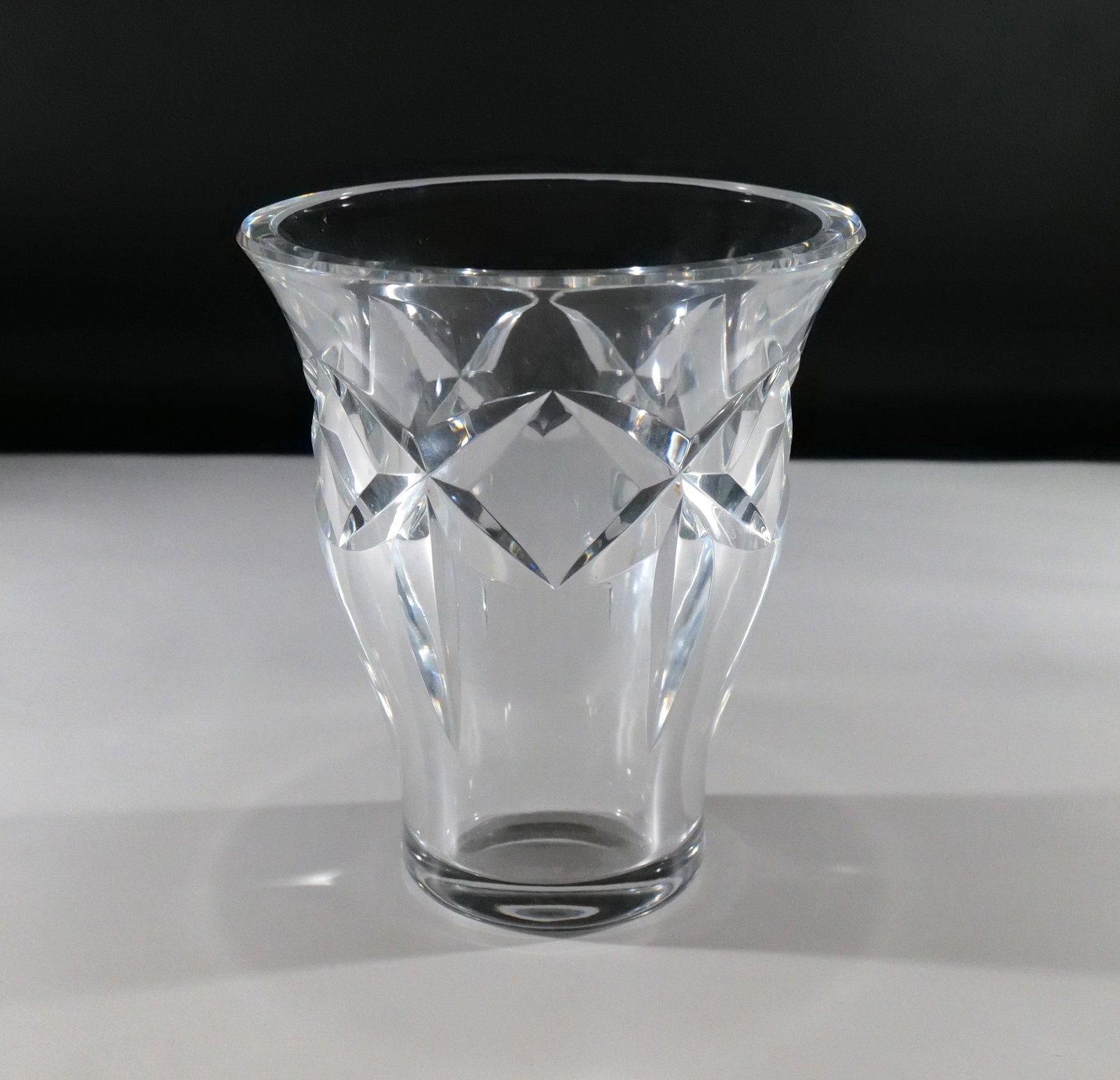 Baccarat Cut Glass Vase: Baccarat Cut Glass Vase. Measures 7" tall x 5.75" wide. All invoices must be paid within 24 hours of the sale. We offer multiple shipping options please read the shipping terms to understand your opti
