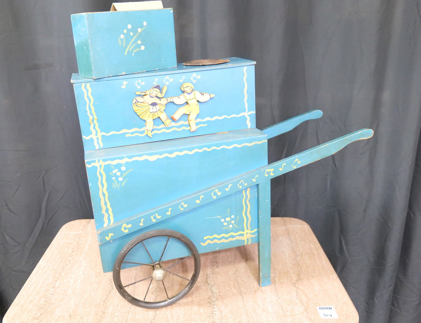 Hand Painted Street Organ: Hand Painted Street Organ - Disc Music Box. Comes with a Made in Switzerland Music Box. All teeth are present. Not Tested. Does not come with key. Comes with 20 discs. Measures 21.5" tall x 26.5" wide