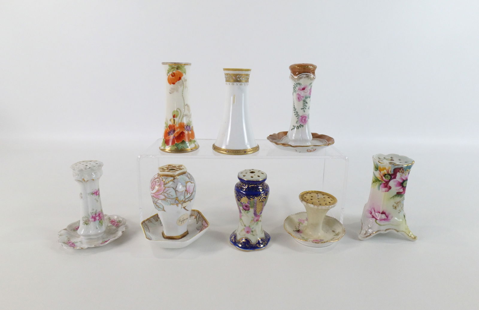 Group Lot of Porcelain Hat Pin Holders: Group Lot of Porcelain Hat Pin Holders including (4) Nippon, Belleek Willets, R & S Prussia, and Others. Some gold gilt on a couple tops are coming off. Largest measures 5" tall. All invoices must be
