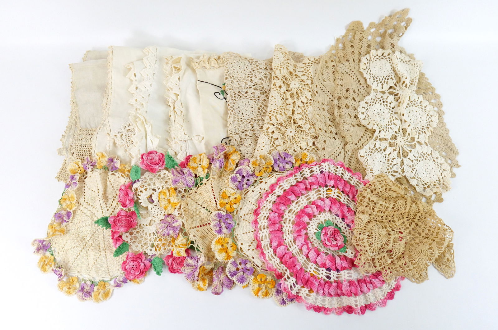 Group Lot of Vintage Textiles and Linens: Group Lot of Vintage Textiles and Linens. Mostly Handmade Doily's. Some staining present. All invoices must be paid within 24 hours of the sale. We offer multiple shipping options please read the ship