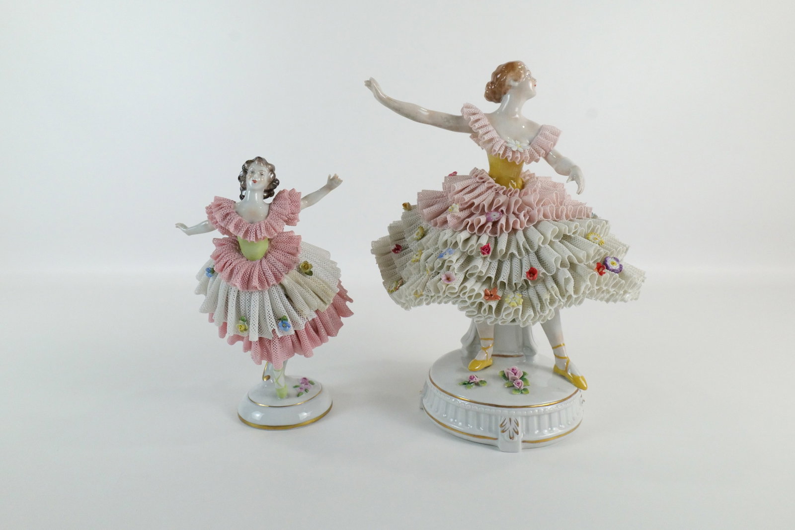 Group Lot of 2 Dresden Porcelain and Lace Figurines: Group Lot of 2 Dresden Porcelain and Lace Ballerina Figurines. Including Oversized Ballerina - Missing Finger, some flowers and minor loss to dress - Marked Sitcendorf and Smaller Ballerina has damage