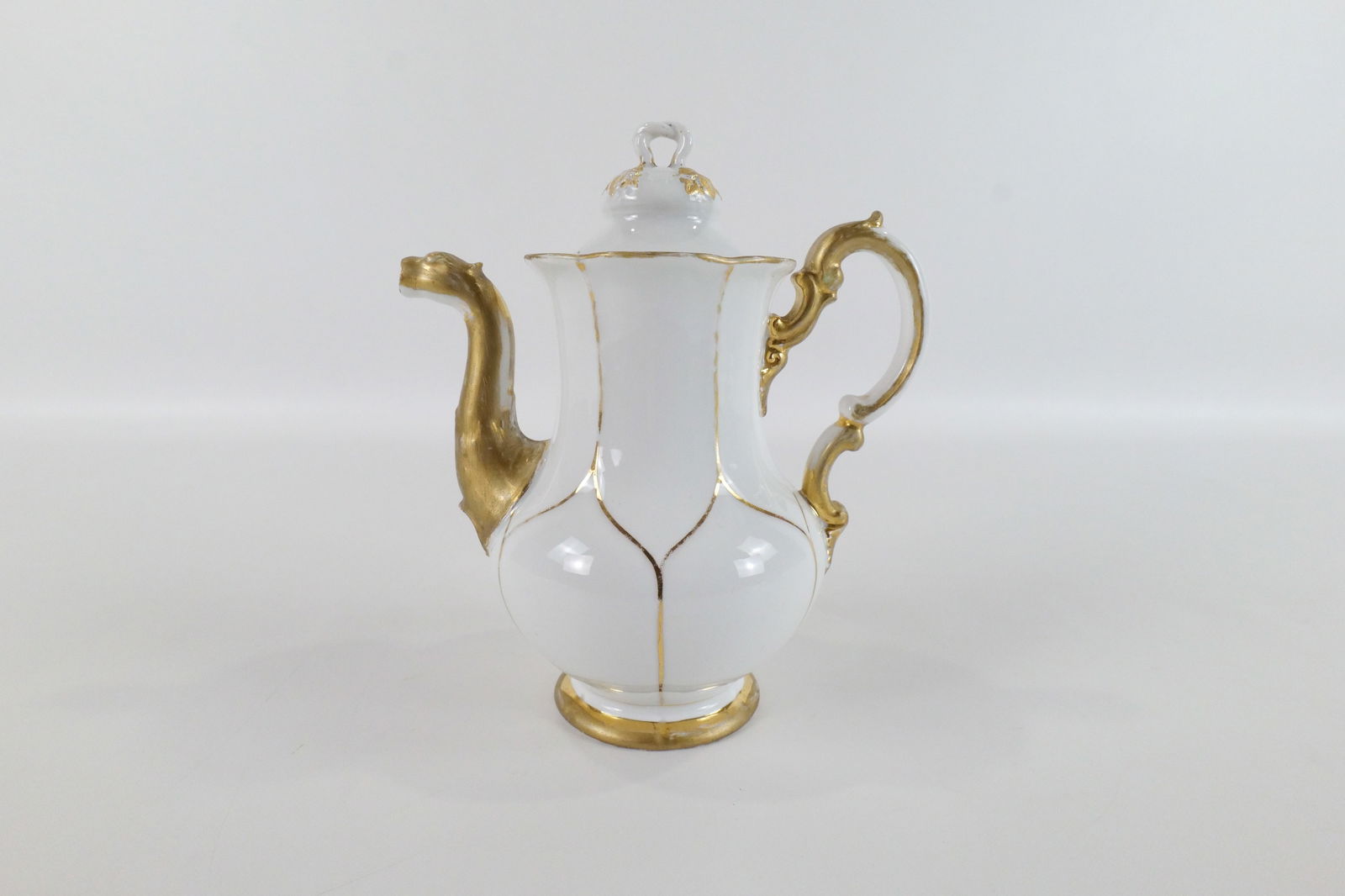 19th Century Meissen Porcelain Tea Pot: 19th Century Meissen Porcelain Tea Pot. Some gold paint loss. Good Condition. Measures 8" tall x 7" wide. All invoices must be paid within 24 hours of the sale. We offer multiple shipping options plea
