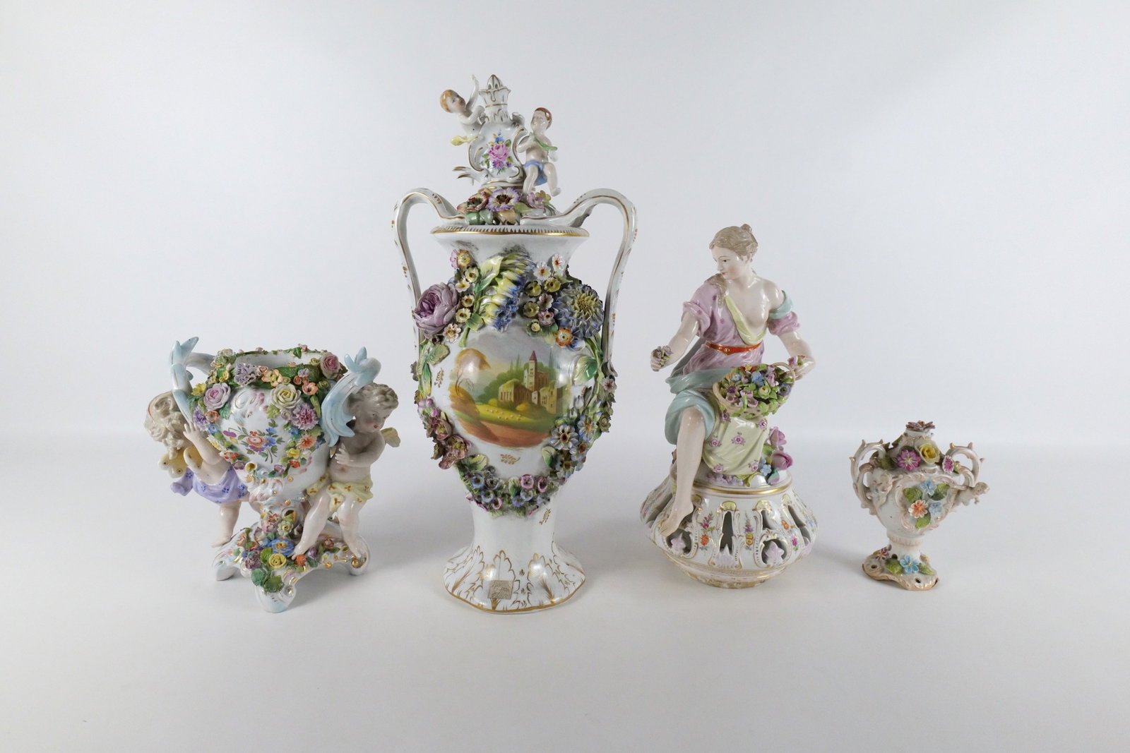 Group Lot of Antique Porcelain - AS-IS: Group Lot of Antique Porcelain - All AS-IS. Including Pictorial Double Handled Vase - Missing Lid, Chips on Inner Rim, & Some chipping on Flowers, Figural Top with Putti's - Chipping on Flowers, Small