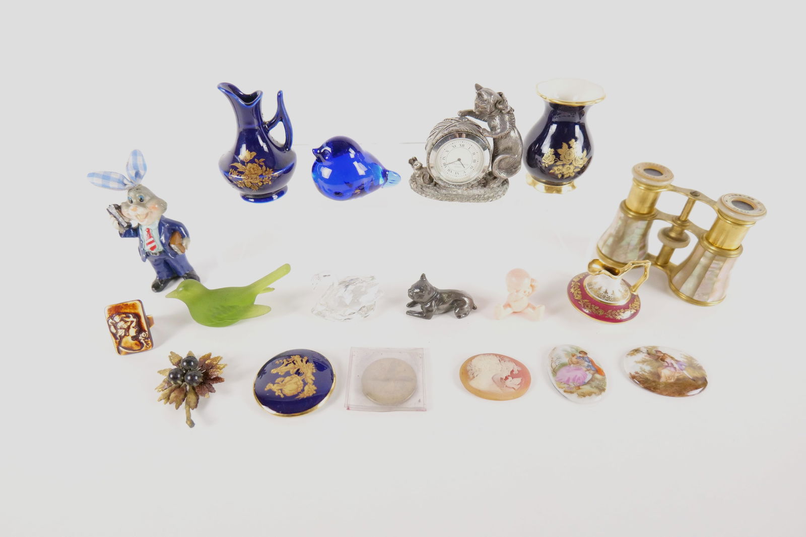 Group Lot of Miniature Decorative Items: Group Lot of Miniature Decorative Items including French Mother of Pearl Antique Opera Glasses, Echt Kobalt Miniature Vase, Limoges Style Urn and Dresser Box Lid, Porcelain Plaques, Reed & Barton Silv