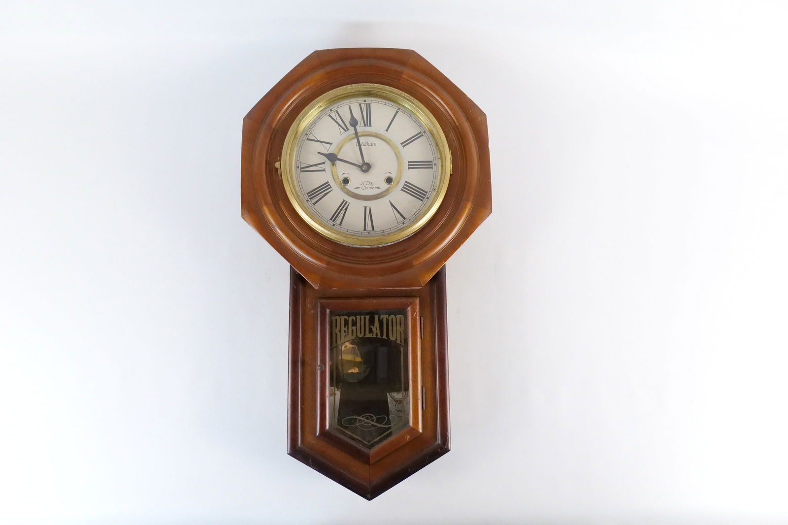 Waltham Wall Regulator 31 Day Chime Clock: Waltham Wall Regulator 31 Day Chime Clock. Interior Showing Rusting. Front Face of Clock and crystal needs to be reattached. Measures 29" tall x 16" wide. All invoices must be paid within 24 hours of