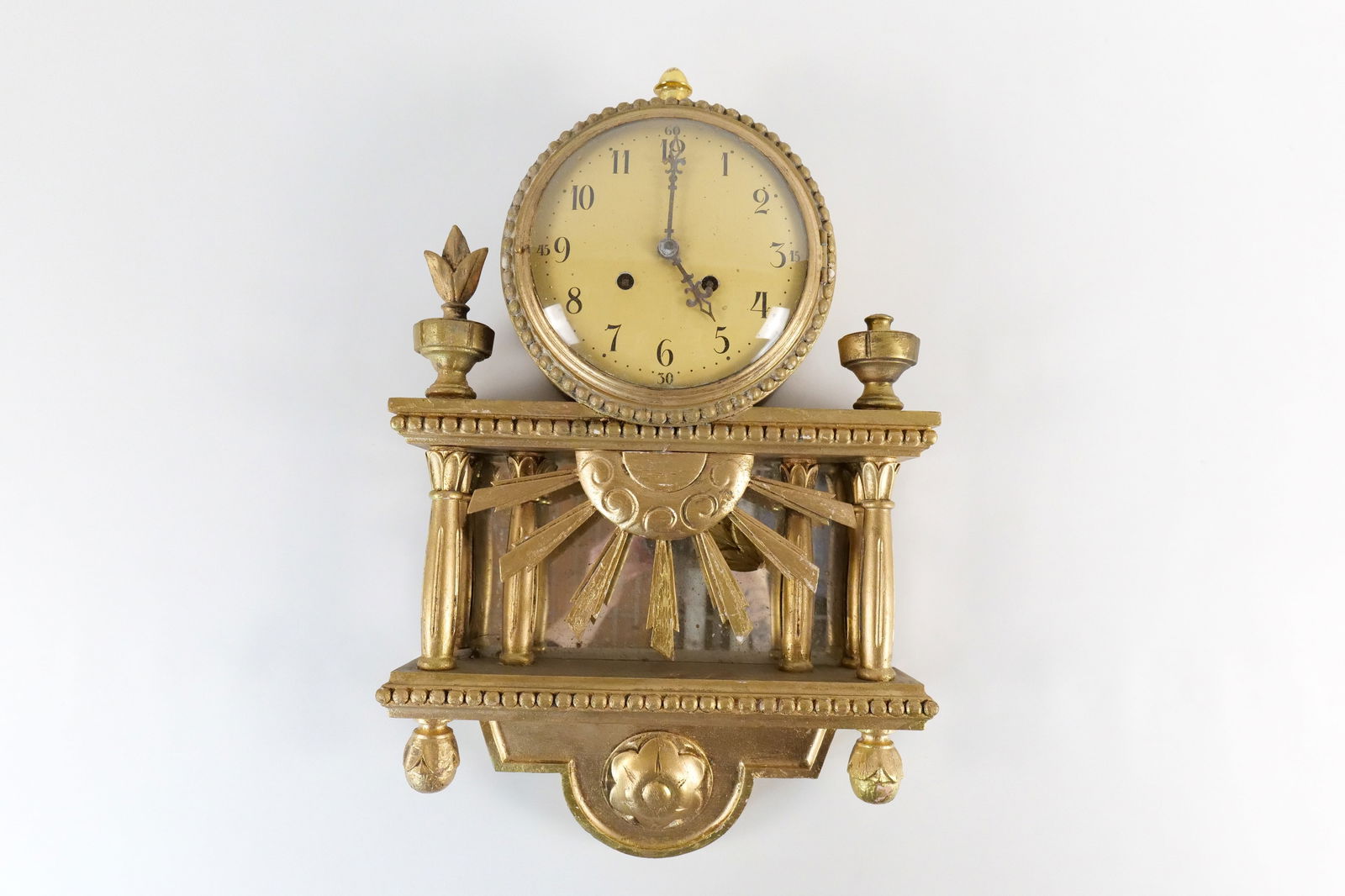 Westerstrand Wall Regulator Decorative Clock: Westerstrand Wall Regulator Decorative Clock. Marked Made in Sweden. Has sunburst front design. Finial needs to be reattached. Minor gilt loss. Measures 23" long x 15" wide. All invoices must be paid