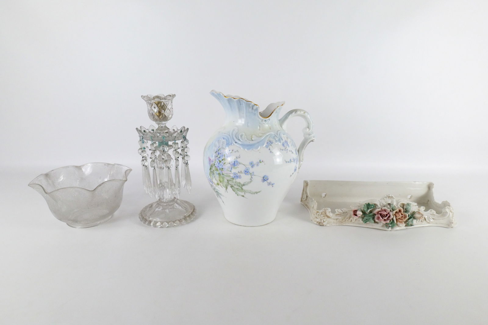 Group Lot of Decorative Items: Group Lot of Decorative Items including Limoges Pitcher, Italian Porcelain Wall Shelf, Etched Victorian Shade, and Baccarat Crystal Single Candlestick. Largest measures 12" tall. All invoices must be