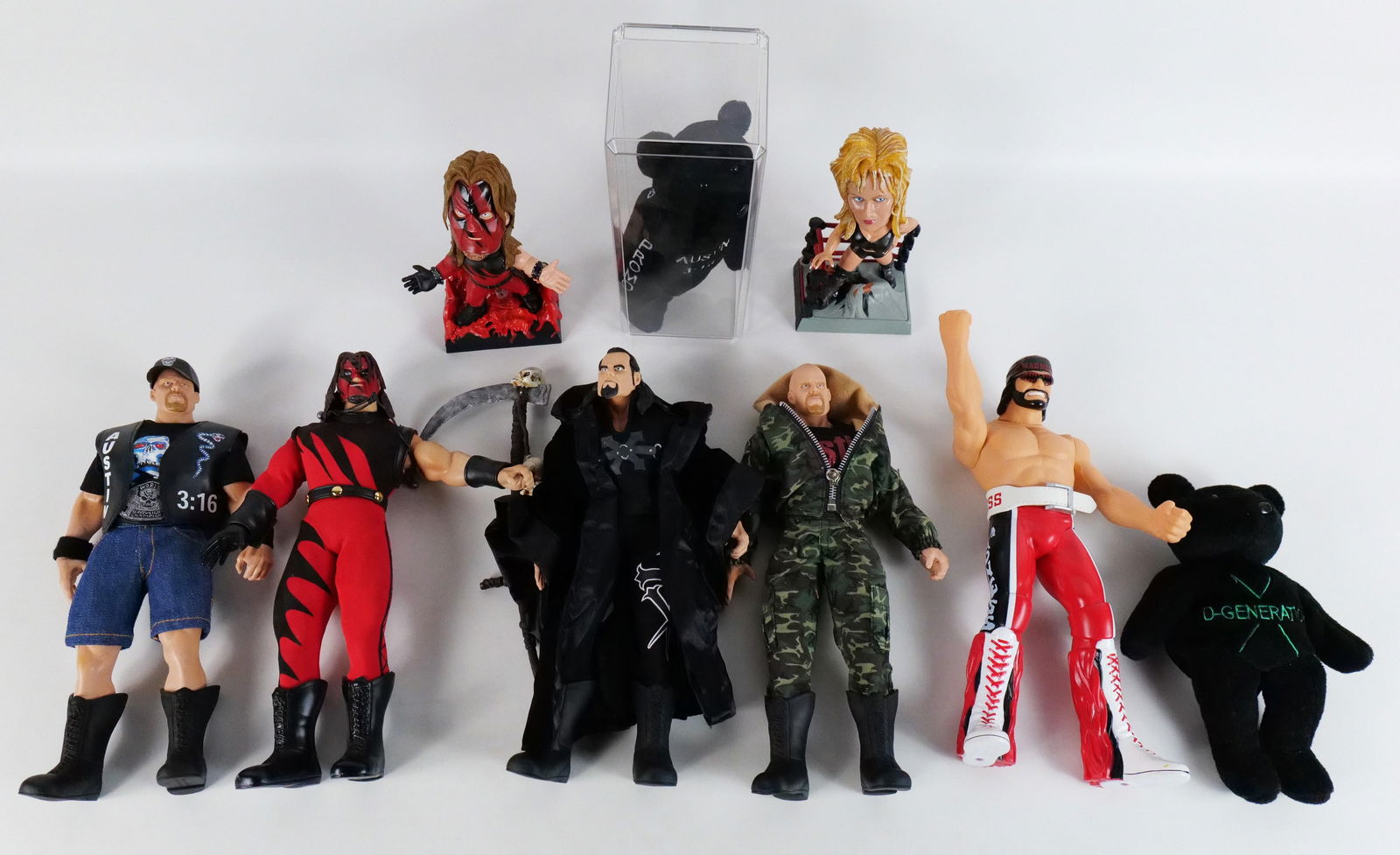 Group Lot of Loose Wrestling Collectibles: Group Lot of Loose Wrestling Collectibles including Steve Austin Beanie Baby, Kane and Sable Jakk'd Up, Federation Fighter Steve Austin, Federation Fighter Undertaker and More. All invoices must be pa