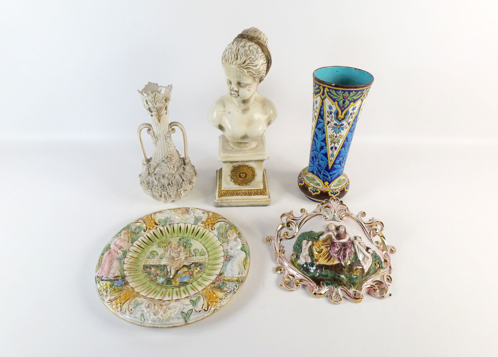 Group Lot of Decor - All AS-IS: Group Lot of Decor - All As-Is. Including Capodimonte Wall Pocket - Chip on top right area, Italian Charger - Chipping on Rim, Double Handled Vase - Missing Bottom - Chipping on Leaves, Resin Bust - C